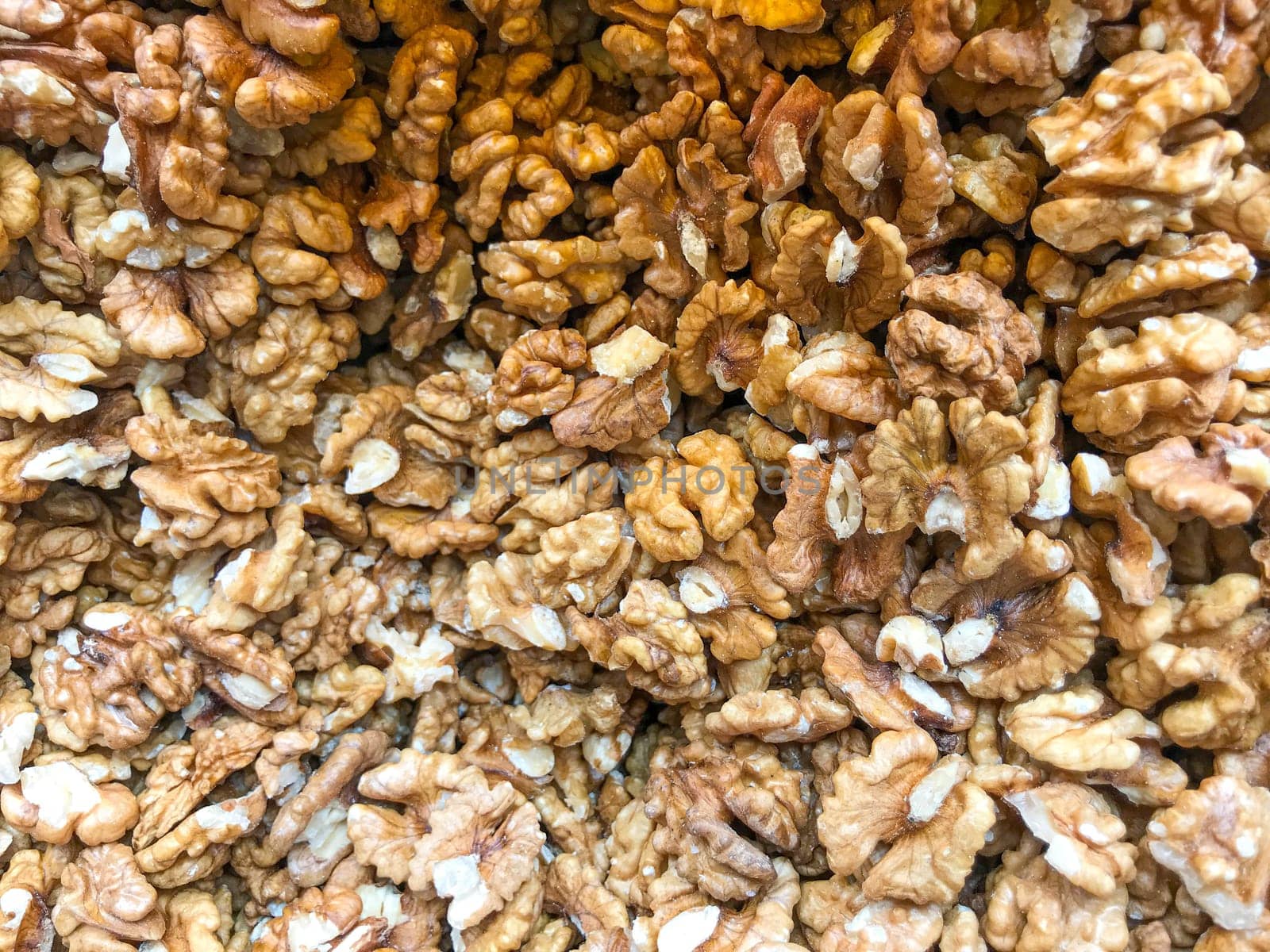 Close-Up Of Peeled Walnuts. Healthy Fresh Food Background.