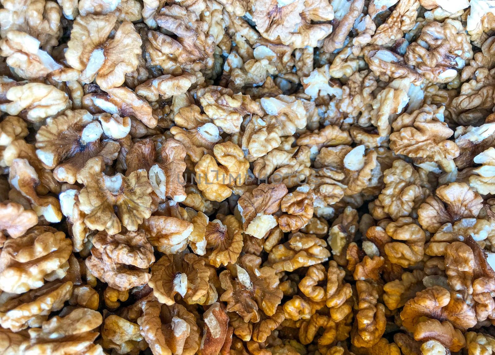 Close-Up Of Peeled Walnuts. Healthy Fresh Food Background.