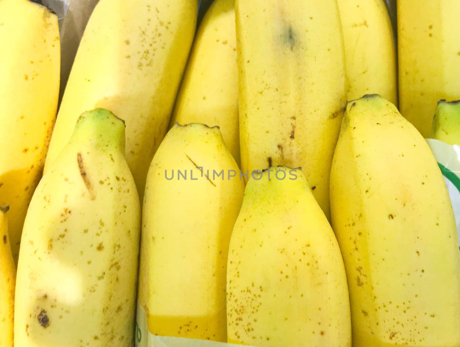 Close-Up Of Ripe Bananas. Healthy Fresh Food Background.