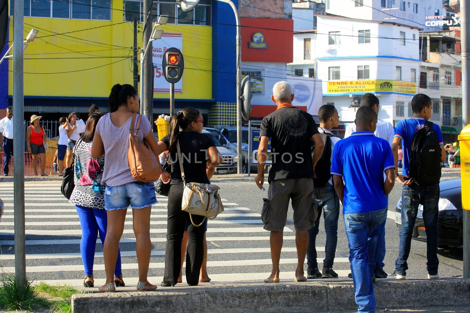 salvador, bahia / brazil - december 5, 2013: people are seen crossing the street in a pedestrian lane in the city of Salvador.
