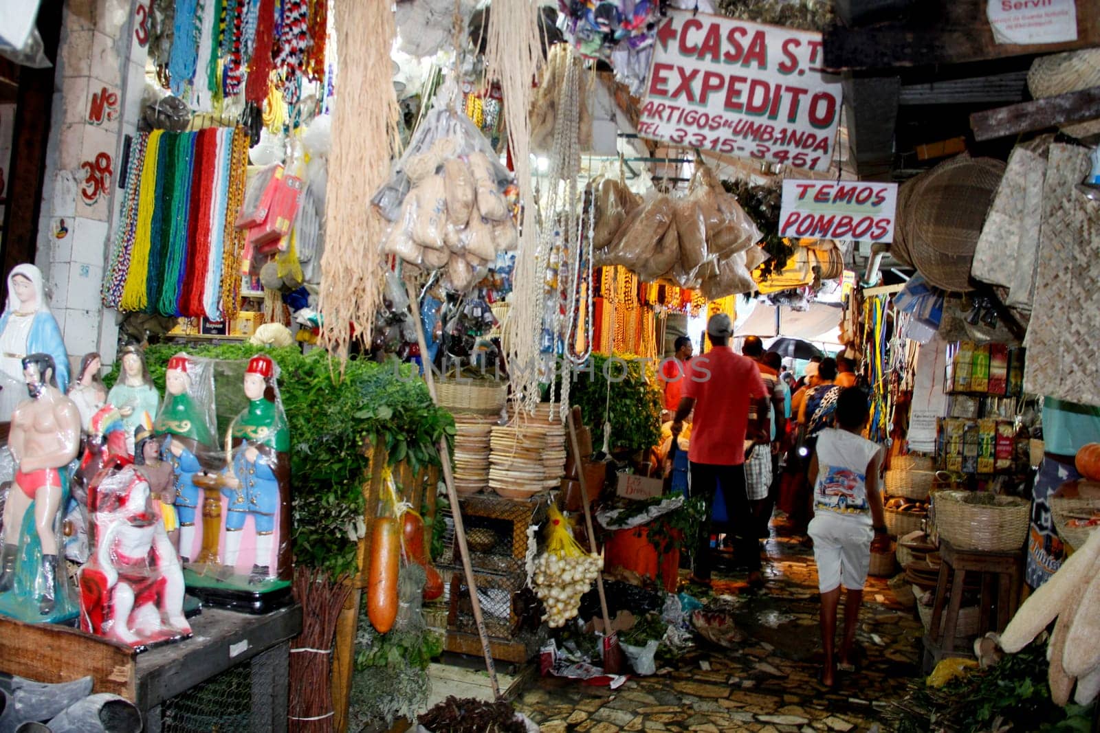 salvador, bahia / brazil - april 21, 2013: article religios for members of the Candomble religion are seen for sale at the Sao Joaquim fair in the city of Salvador.