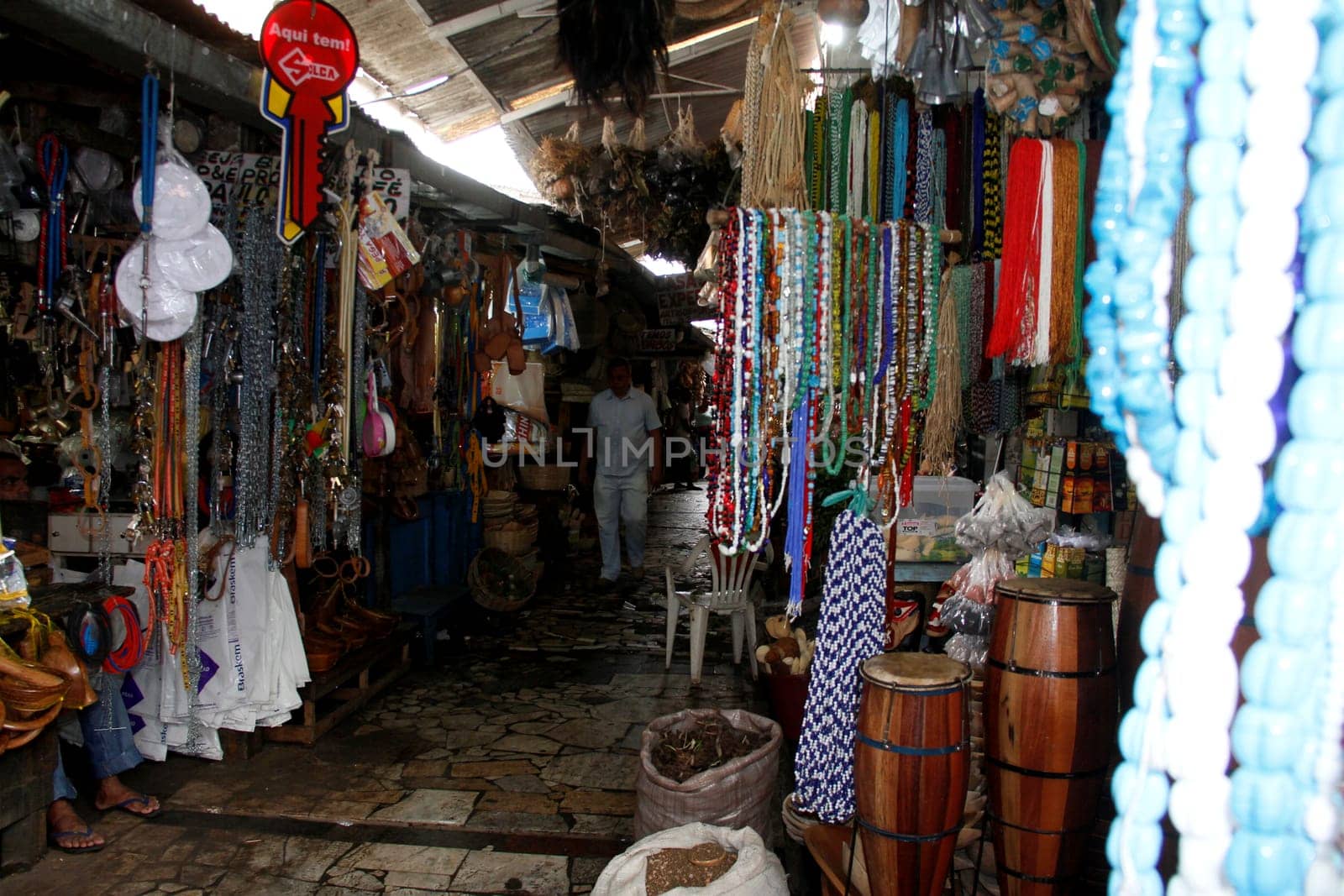 salvador, bahia / brazil - april 21, 2013: article religios for members of the Candomble religion are seen for sale at the Sao Joaquim fair in the city of Salvador.