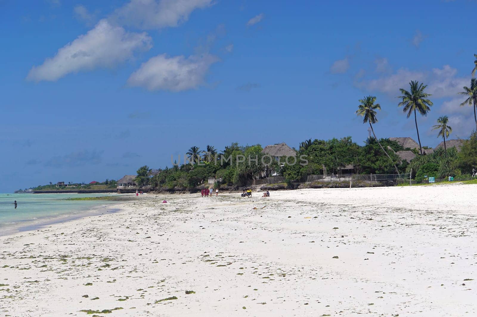 Zanzibar, Tanzania - July 17, 2017: White sand beach in east Zanzibar, Tanzania.