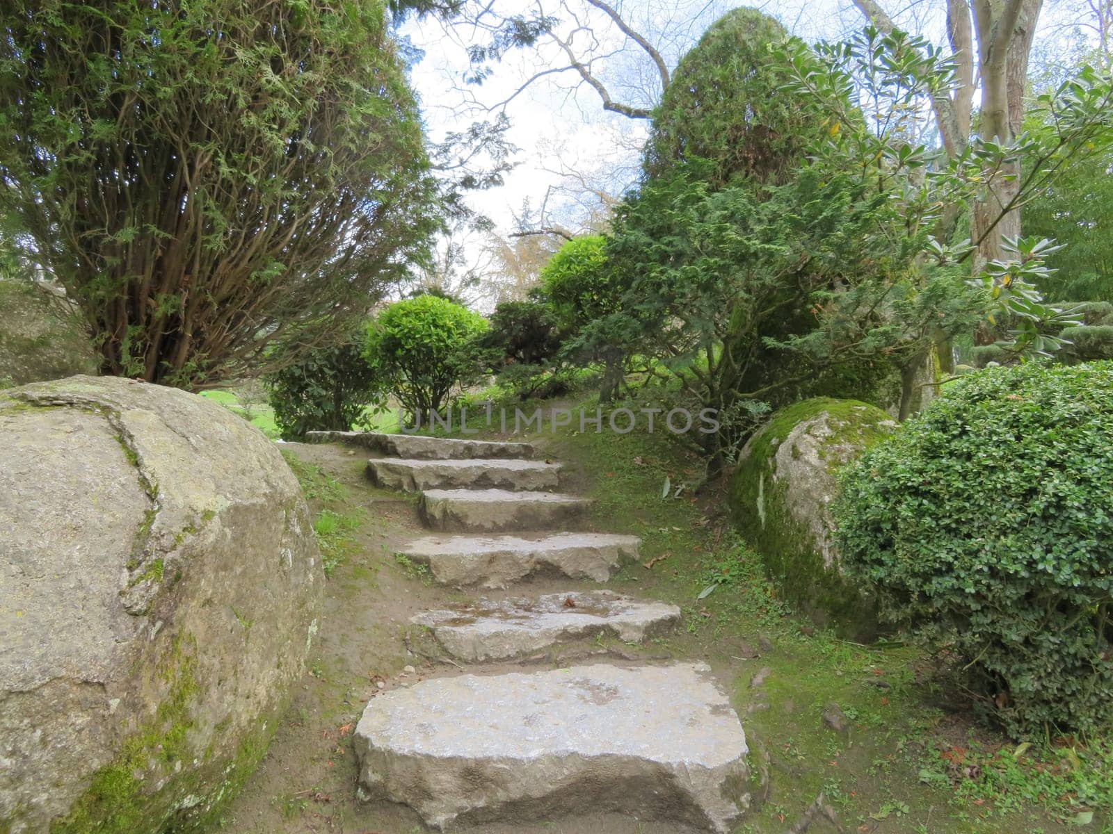 Beautiful Japanese garden in the city of Toulouse with lake and bridge
