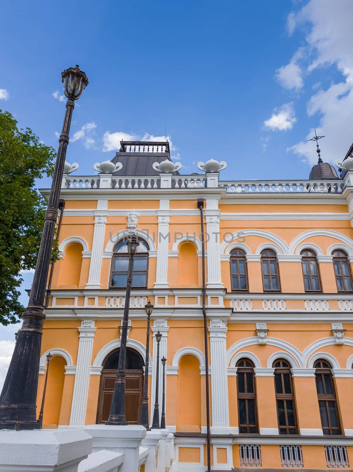 Outdoor architecture details of the Manuc Bei mansion yard and street lamps. Manuc Bey manor, culture and historic complex with museum, winery and other edifices located in Hincesti city, Moldova.