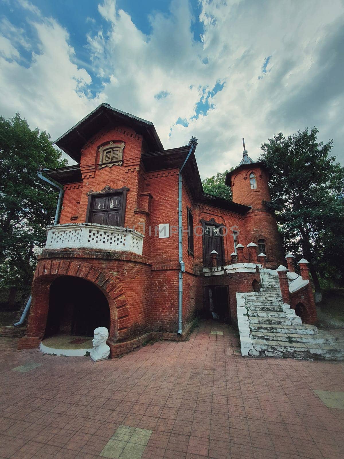 The Hunting Castle facade, Manuc Bei mansion, architectural, culture and historic complex of Hincesti city, Moldova. Ancient brick building. Halloween haunted house theme concept, ghost home or manor.