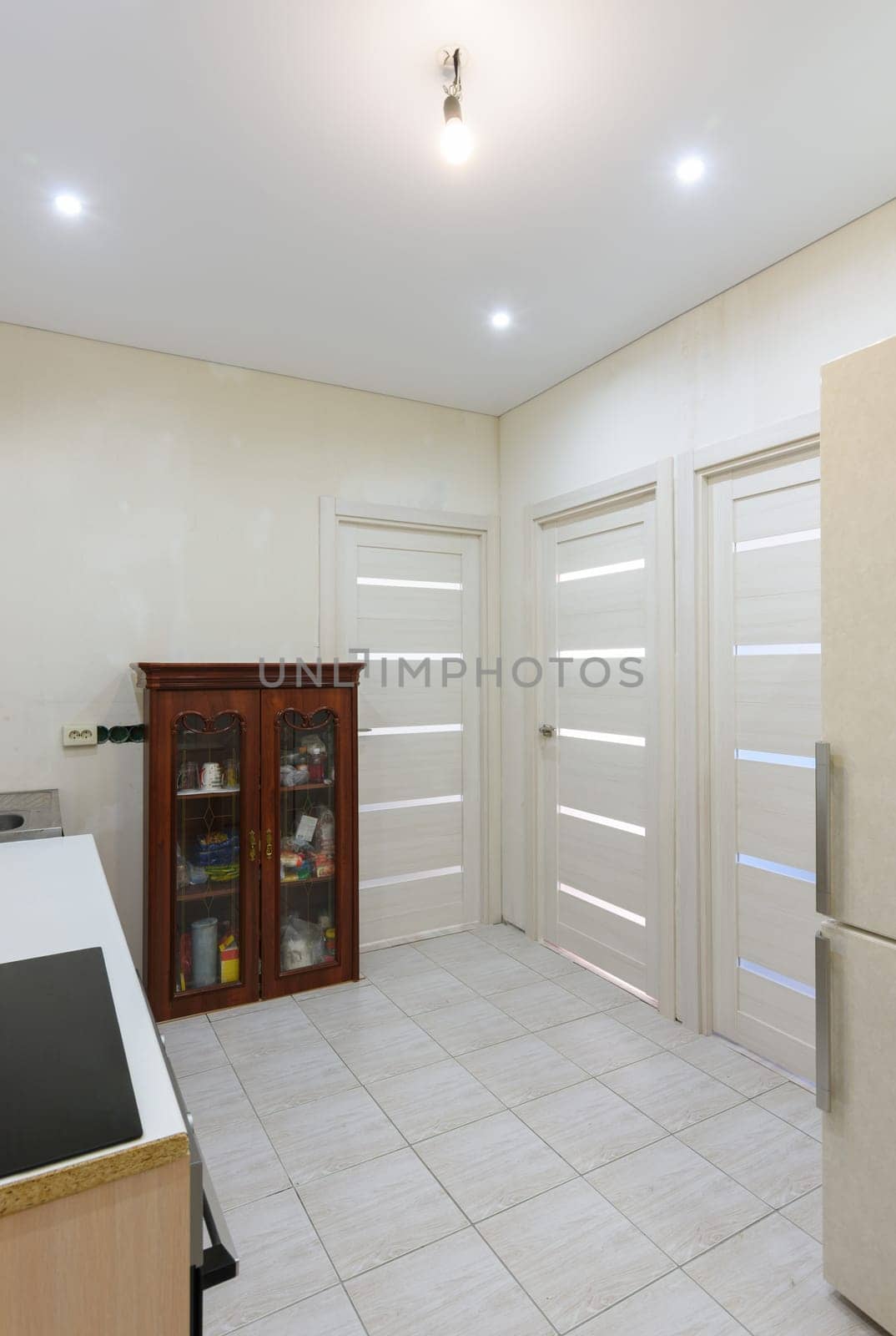 Interior of a new living room kitchen with temporary furniture in a new building