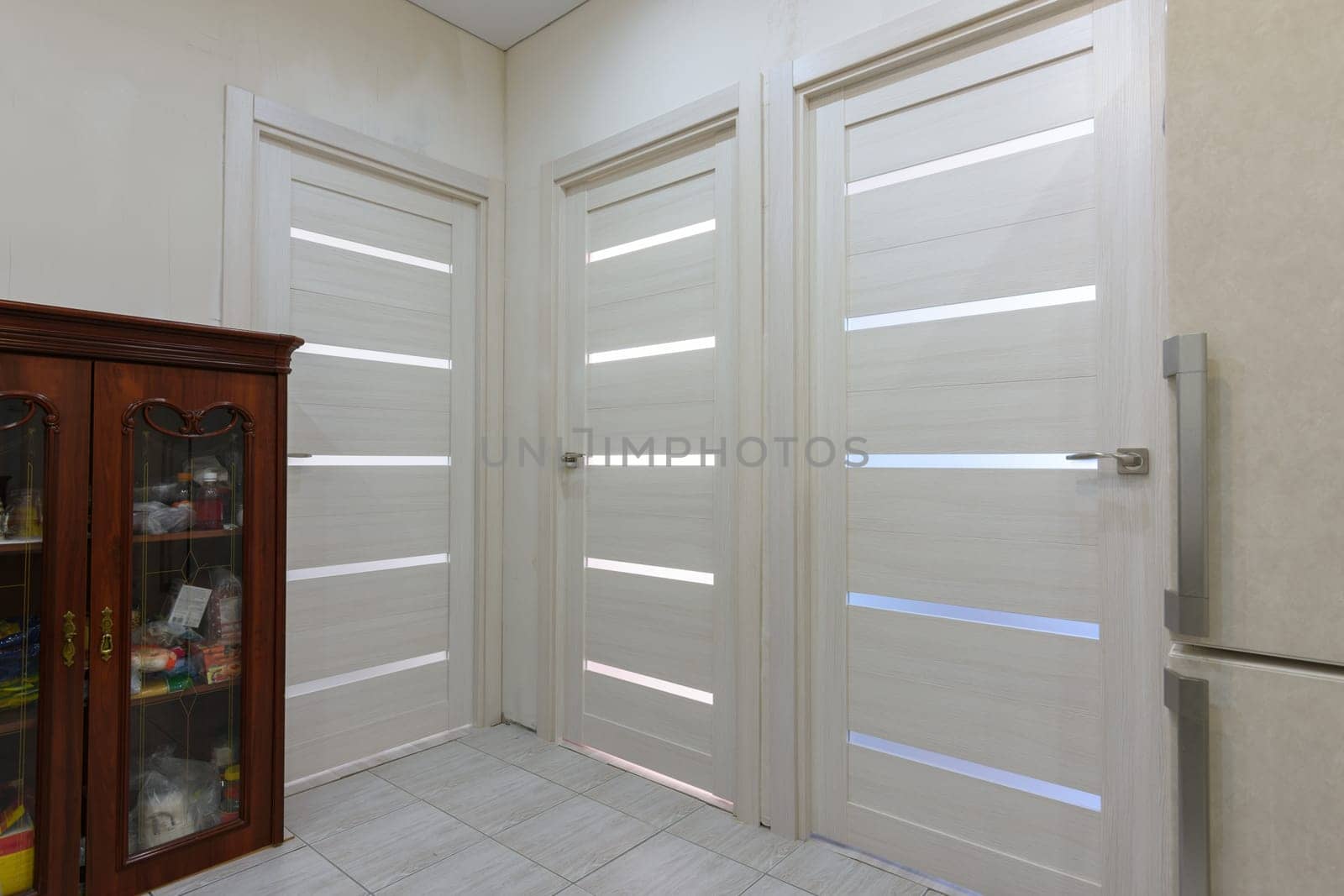 Three interior doors in the apartment close up