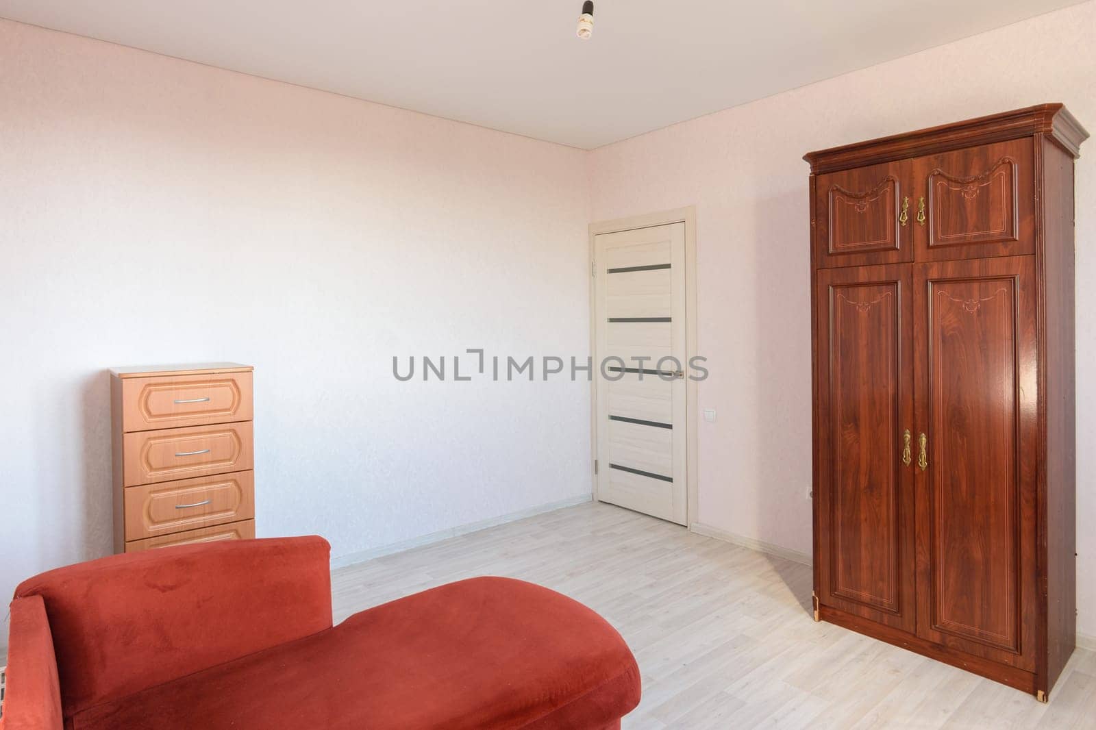 Room interior with modest old furniture