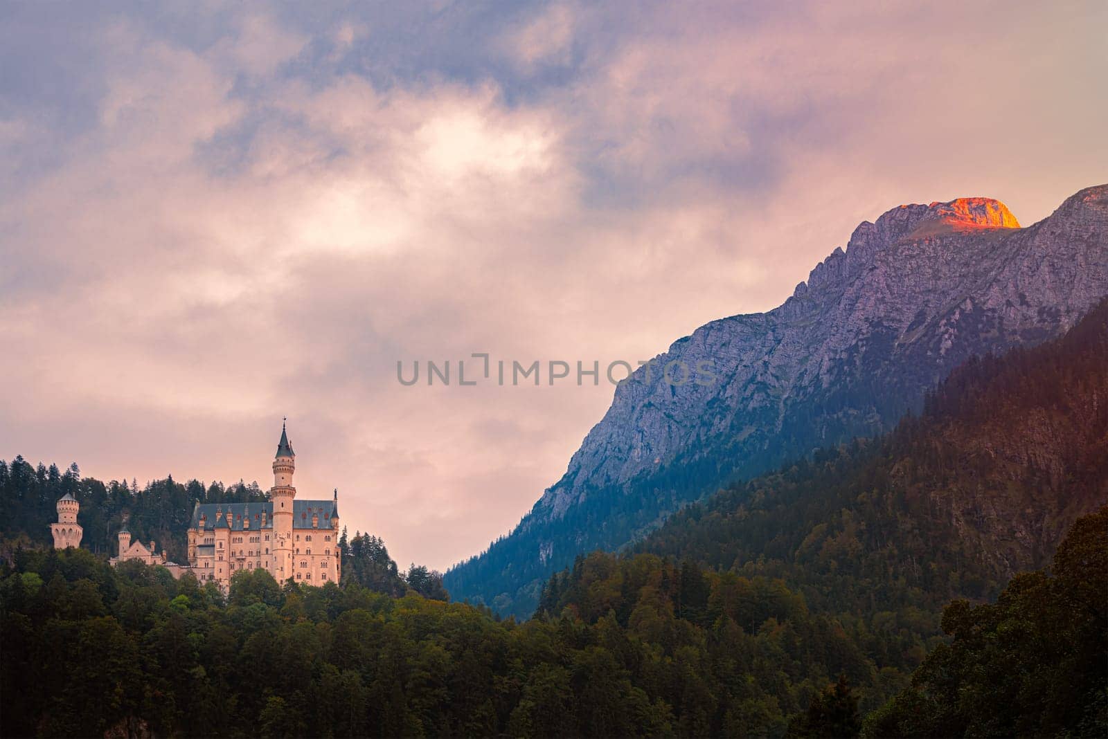 Beautiful view of world-famous Neuschwanstein Castle, the nineteenth-century Romanesque Revival palace built for King Ludwig II on a rugged cliff near Fussen, southwest Bavaria, Germany, Europe
