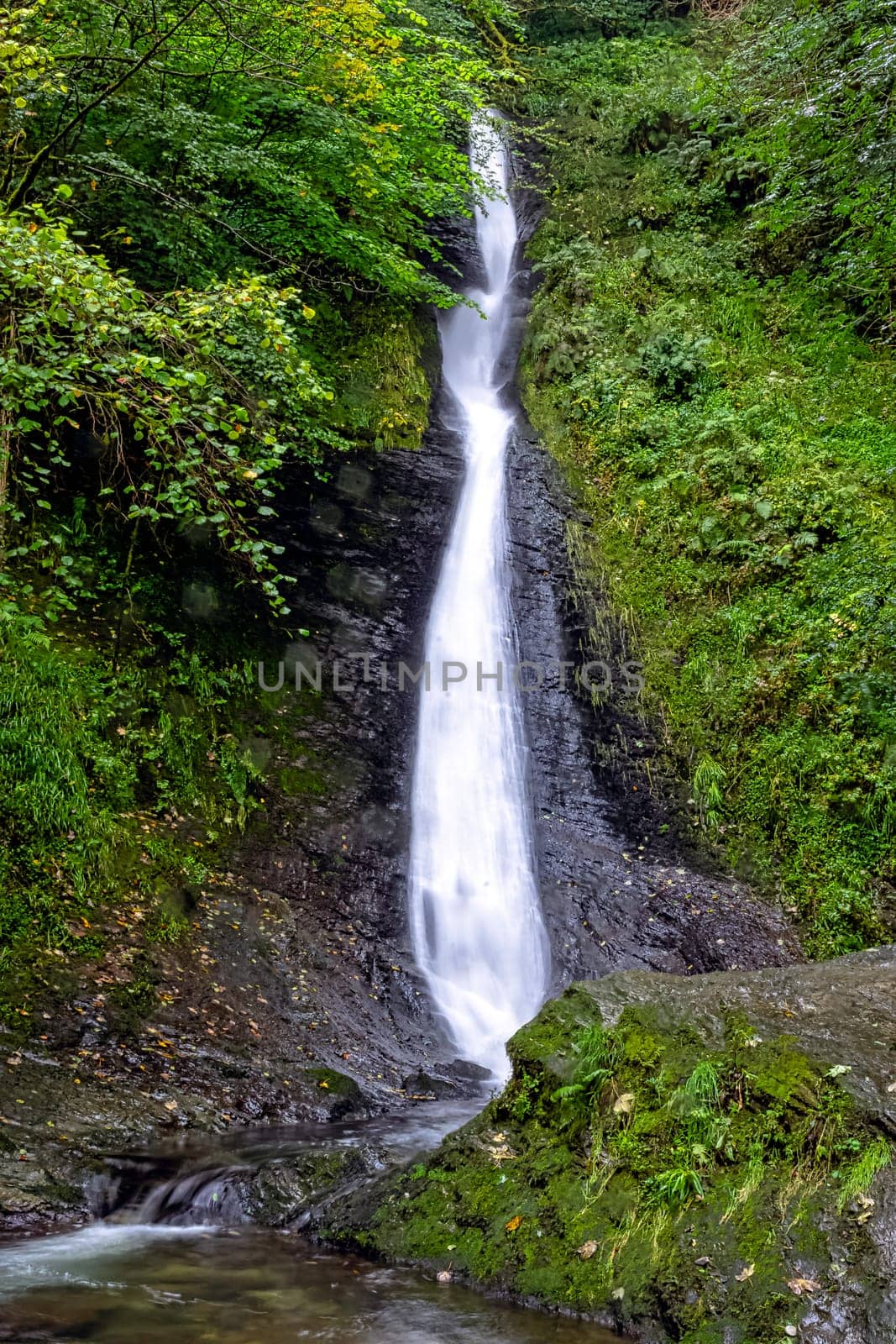 Whitelady waterfall in rain - Lydford, Dartmoor National Park, Devon, United Kingdom