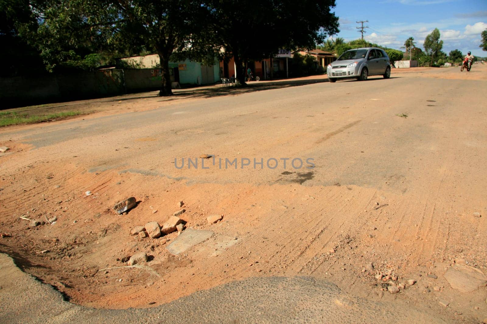 eunapolis, bahia / brazil - april 8, 2009: holes are seen on highway BA 280, a road that connects the municipalities of Itabela to Guaratinga in southern Bahia..