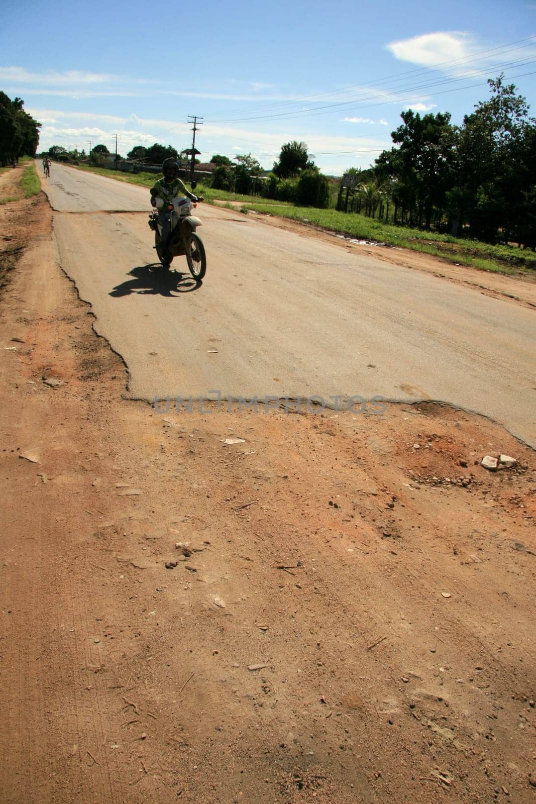 eunapolis, bahia / brazil - april 8, 2009: holes are seen on highway BA 280, a road that connects the municipalities of Itabela to Guaratinga in southern Bahia..