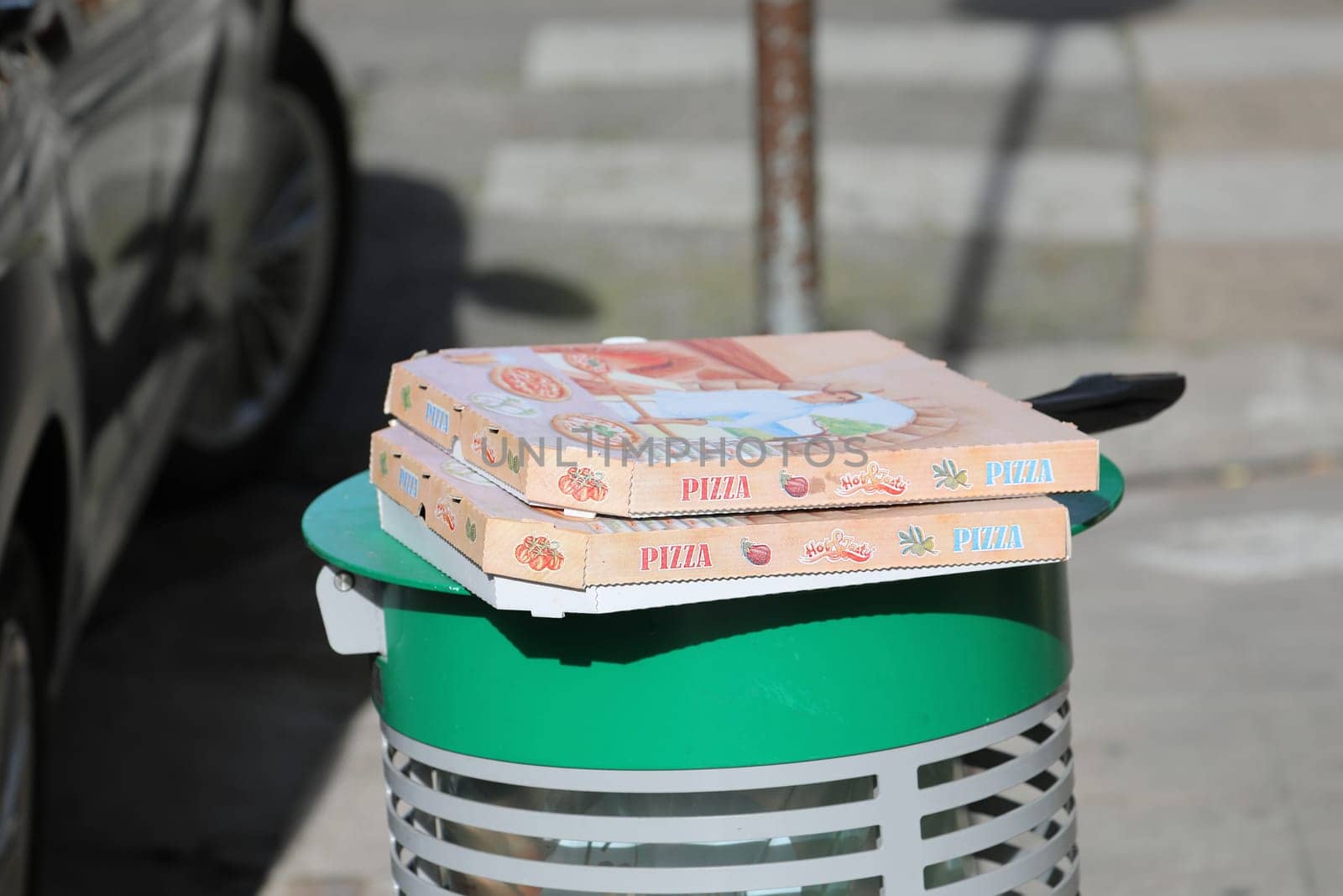 Nice, France - January 29, 2019: Empty Pizza Boxes On A Trash Can In The Street In Nice On The French Riviera, France, Europe