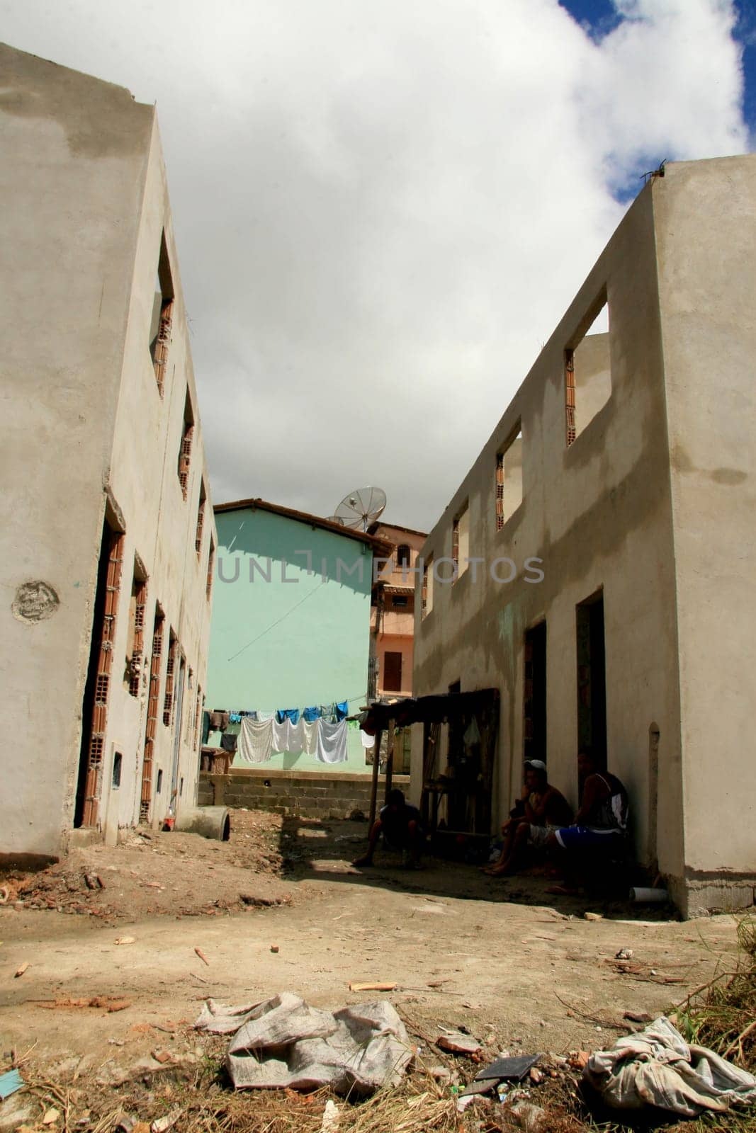 eunapolis, bahia / brazil - january 15, 2009: people who are members of the Association Residents Without a Roof are seen during the invasion of houses under construction, aimed at poor families in the city of Eunapolis....
