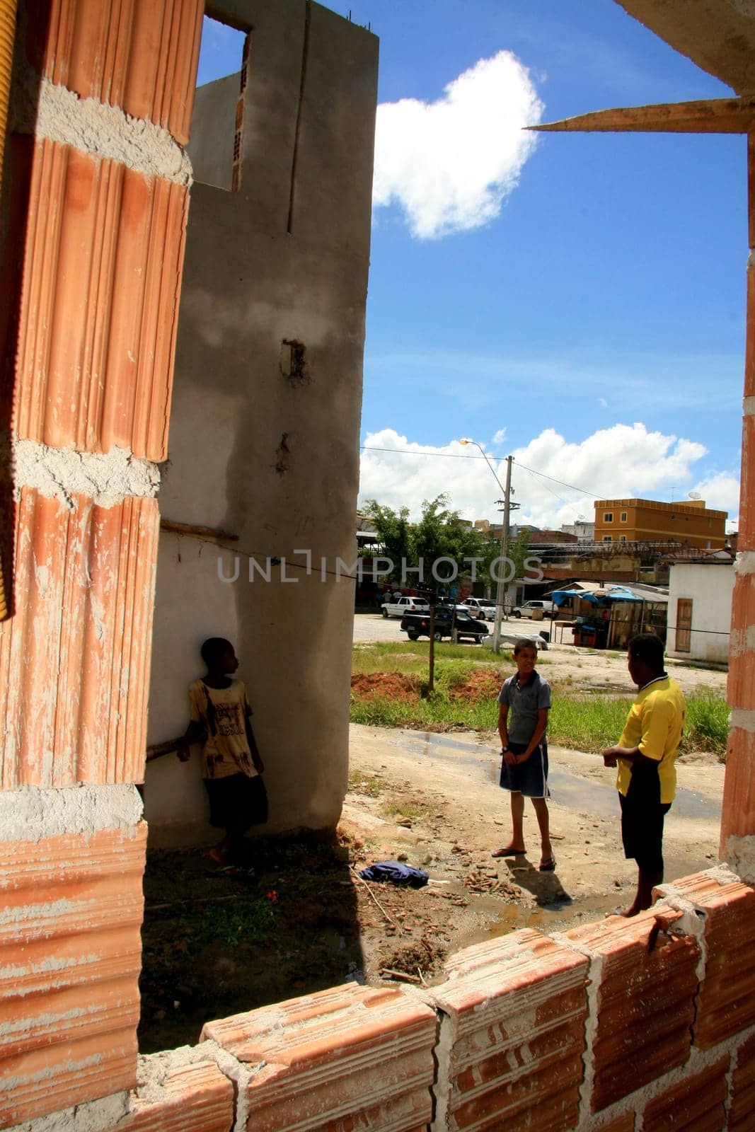 eunapolis, bahia / brazil - january 15, 2009: people who are members of the Association Residents Without a Roof are seen during the invasion of houses under construction, aimed at poor families in the city of Eunapolis....