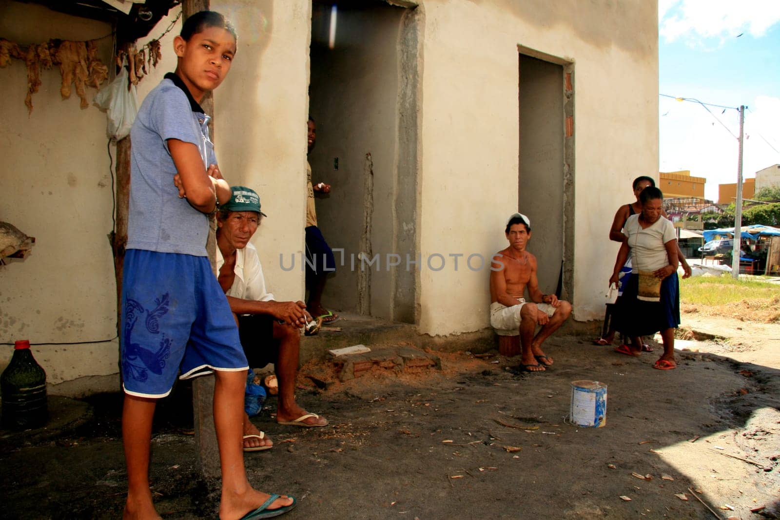 eunapolis, bahia / brazil - january 15, 2009: people who are members of the Association Residents Without a Roof are seen during the invasion of houses under construction, aimed at poor families in the city of Eunapolis....