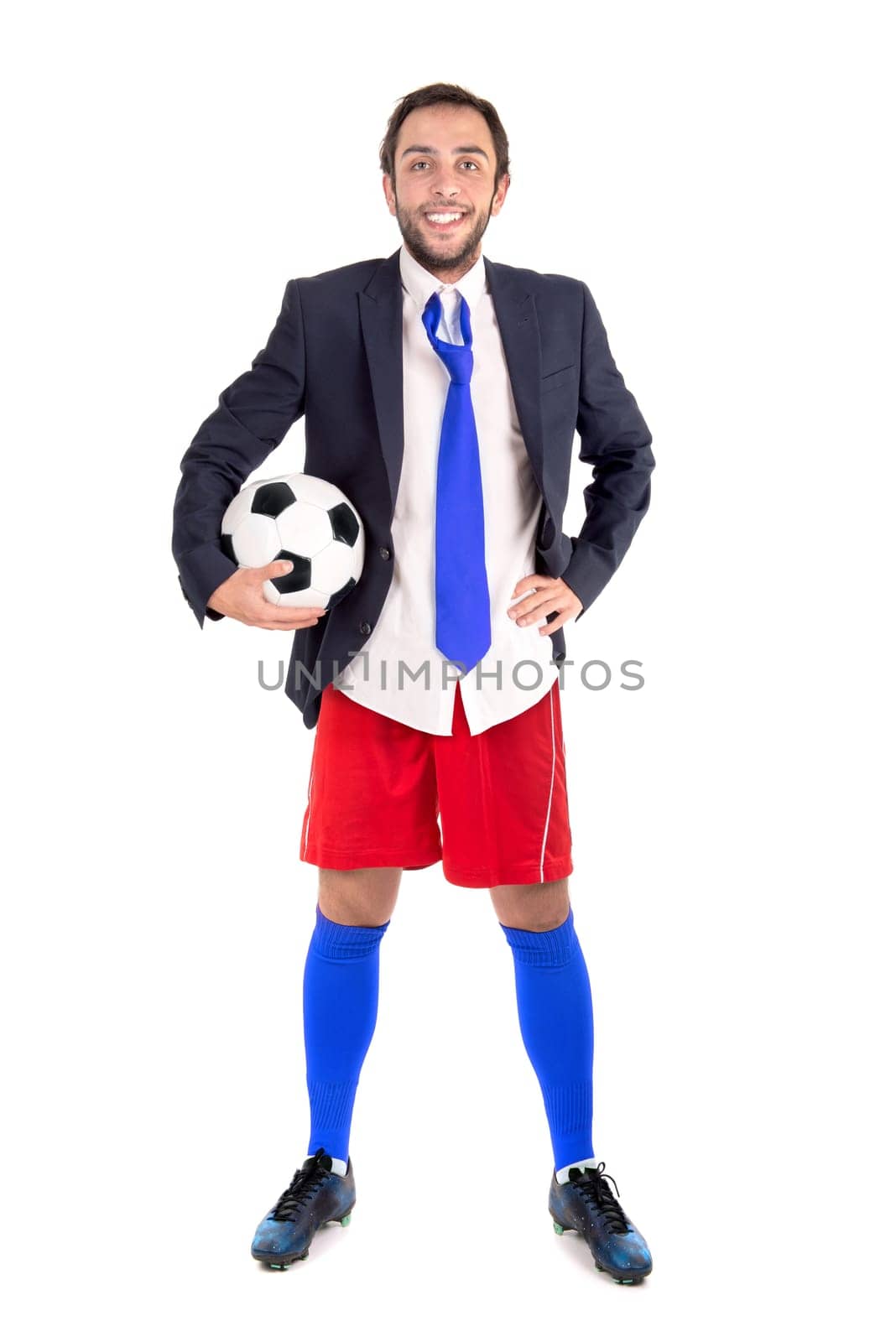 Businessman with soccer ball posing isolated in white
