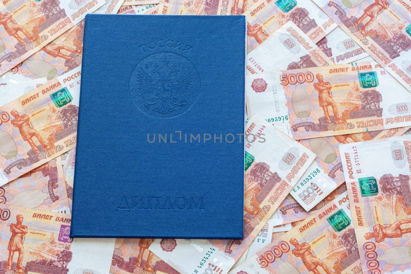 A diploma of higher education is on the five thousandth Russian rubles