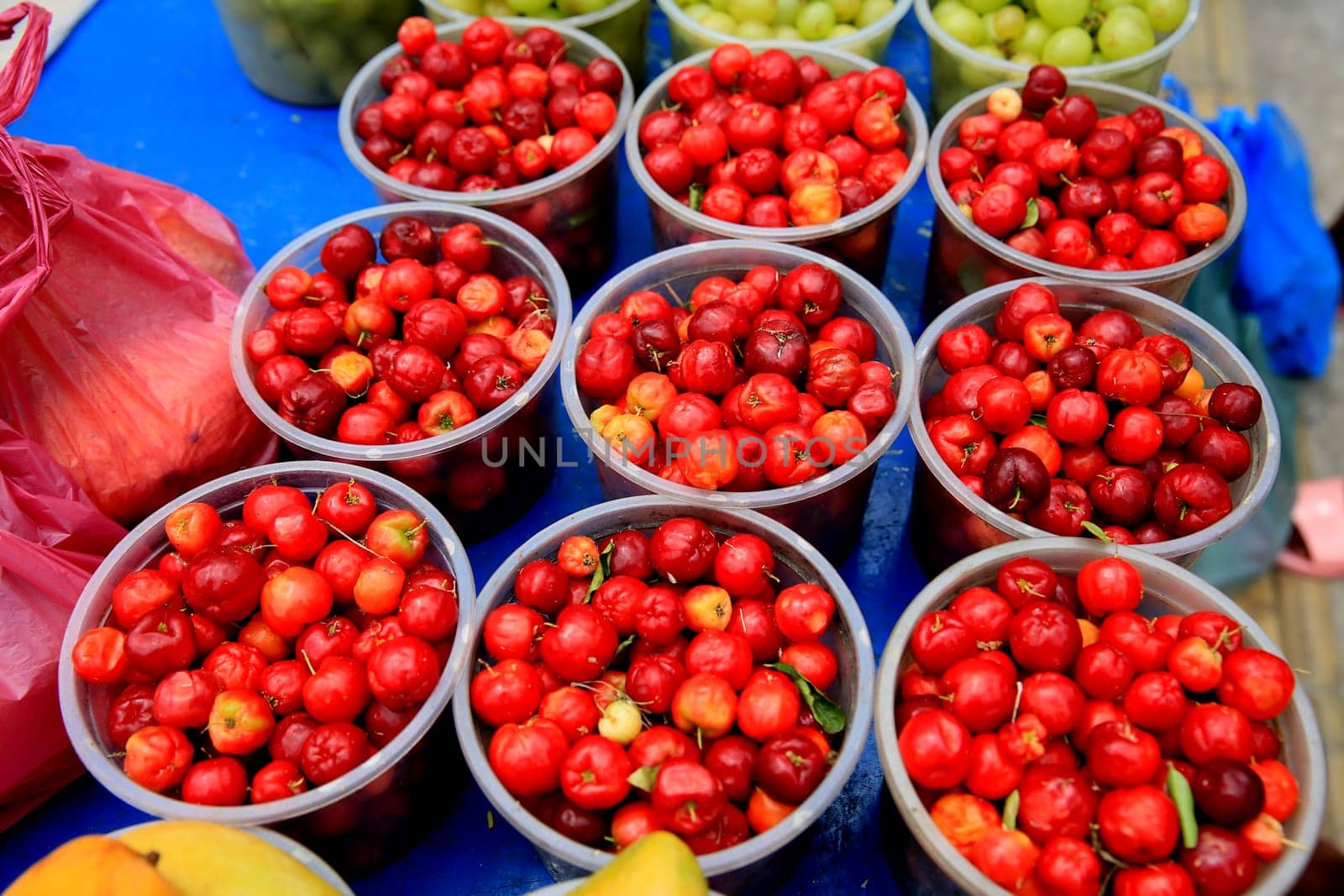 salvador, bahia / brazil - september 11, 2020: acerola fruits are seen for sale on the street in the city of Salvador.