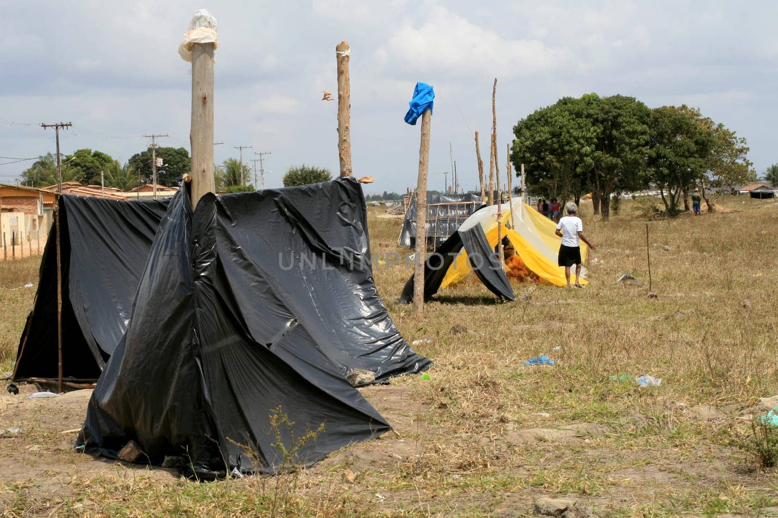 eunapolis, bahia / brazil - april 8, 2009: members of the Movimento Sente Terra - MST - are seen during the occupation of a farm invaded in the rural area of the municipality of Eunapolis....