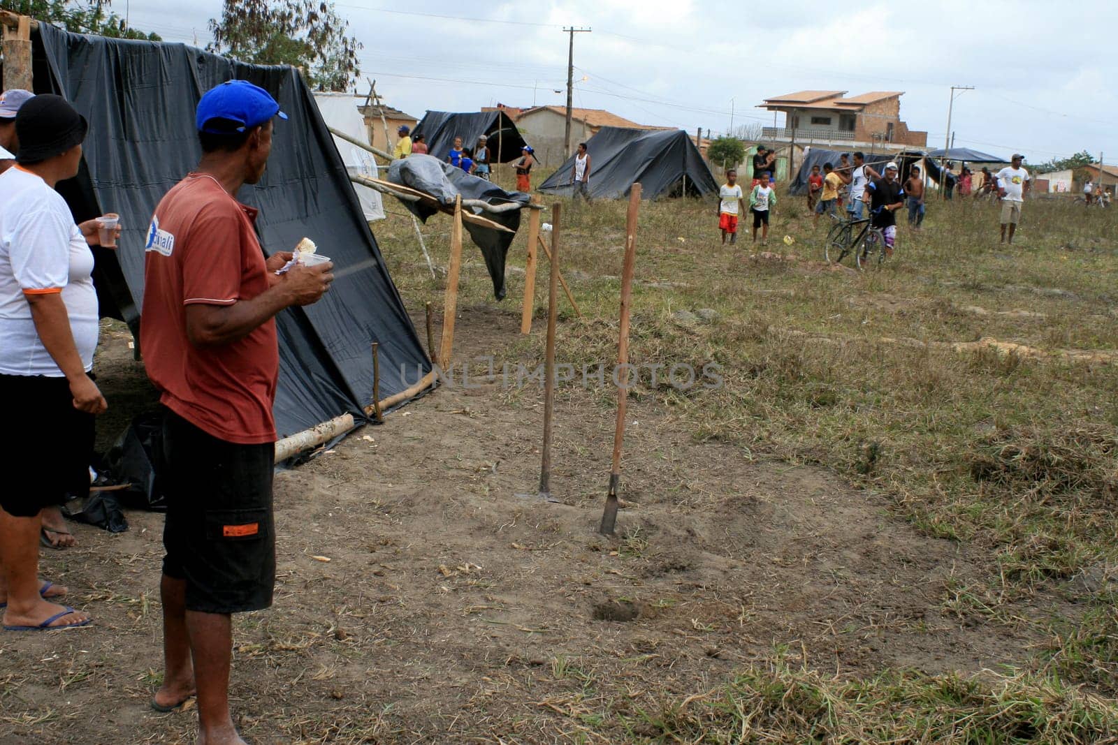 eunapolis, bahia / brazil - april 8, 2009: members of the Movimento Sente Terra - MST - are seen during the occupation of a farm invaded in the rural area of the municipality of Eunapolis....
