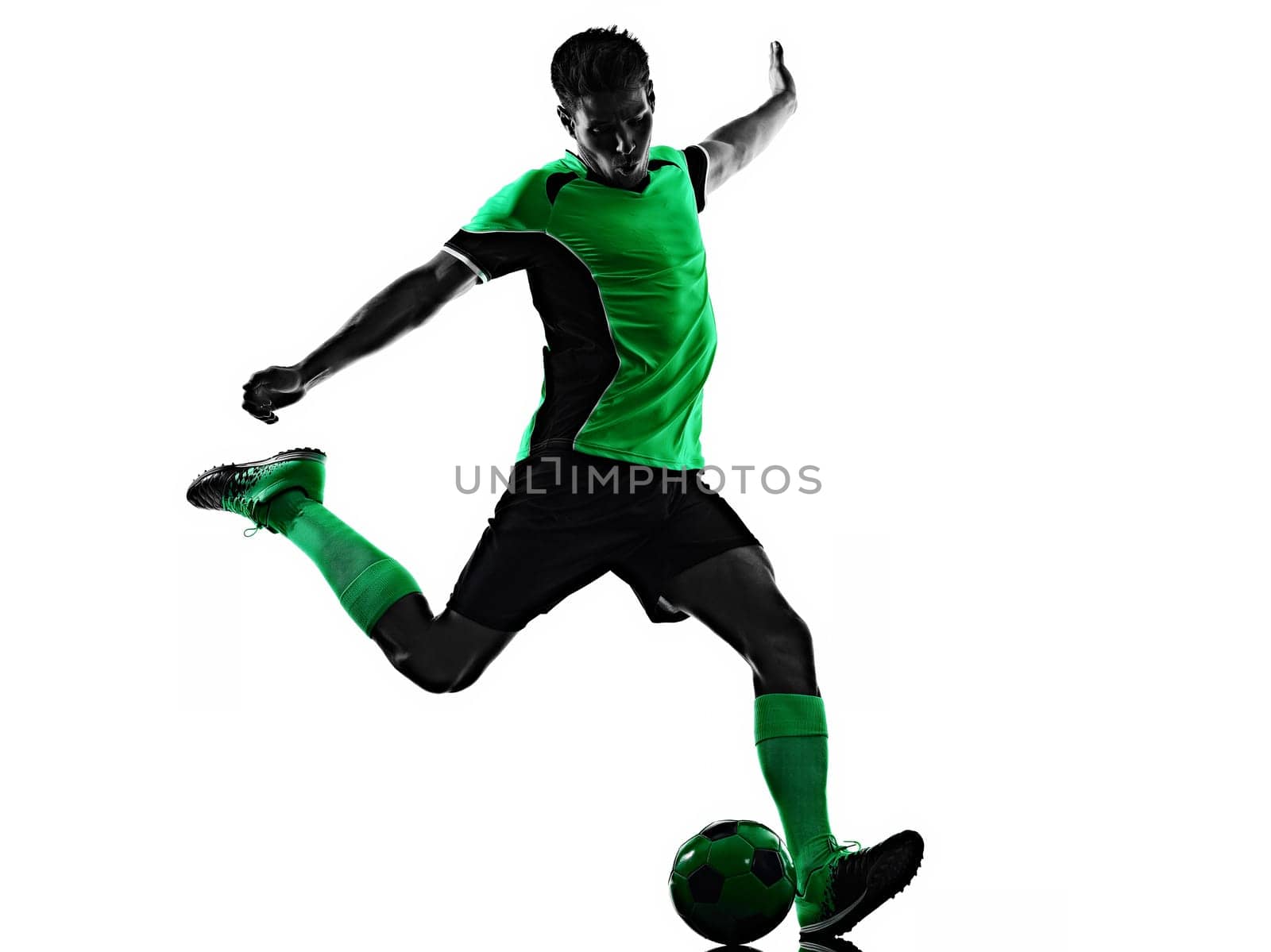 one young caucasian soccer player silhouette shadow in studio isolated on white background