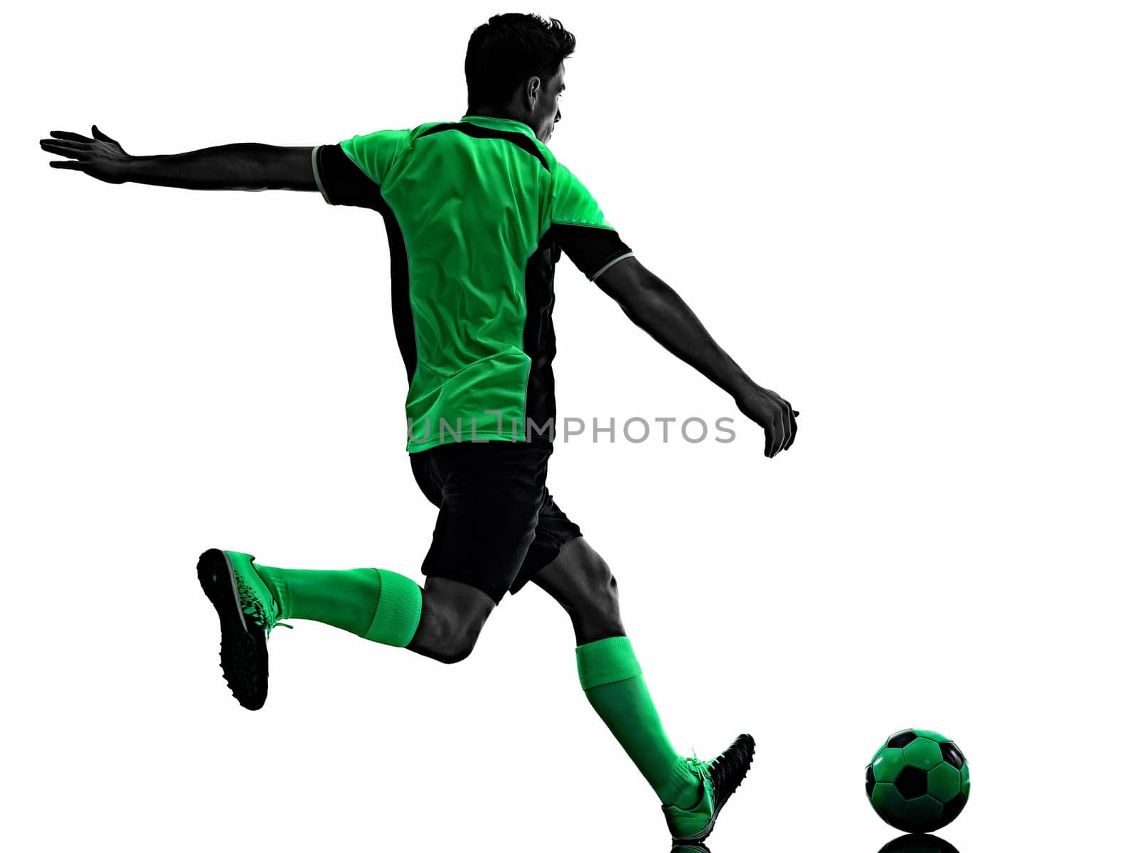 one young caucasian soccer player silhouette shadow in studio isolated on white background