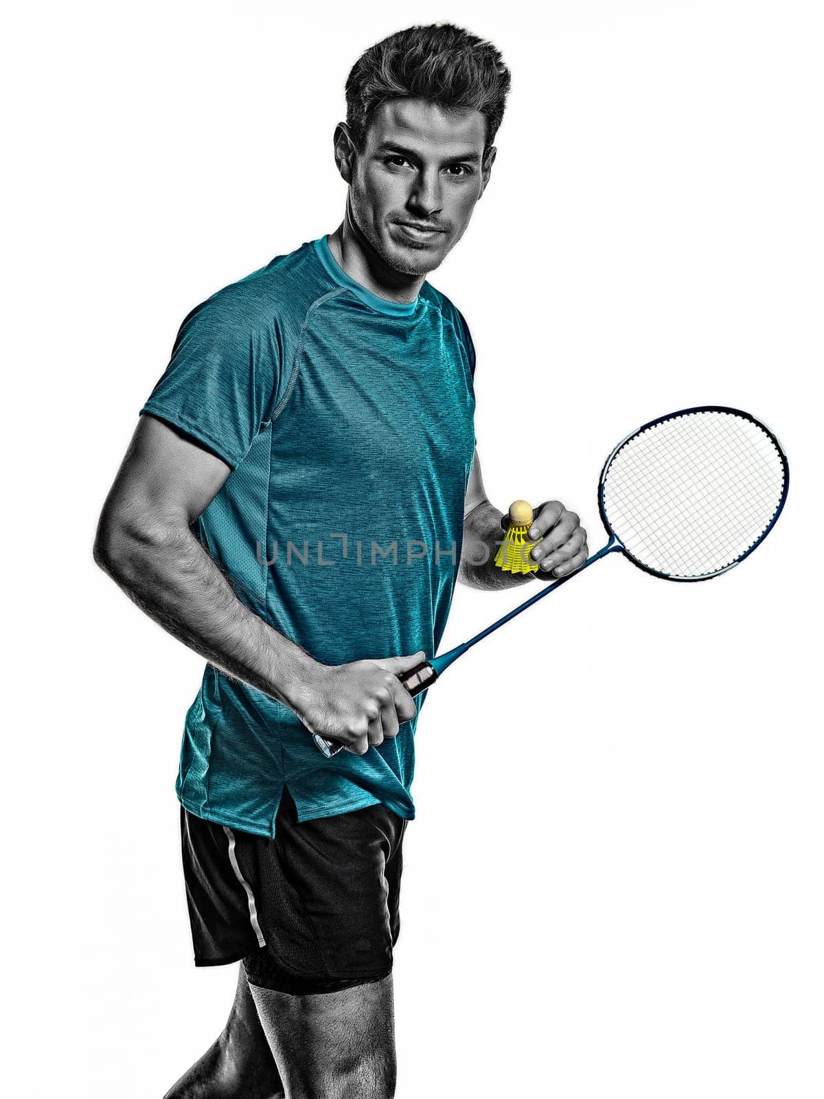 one caucasian youg Badminton player man in studio isolated on white background