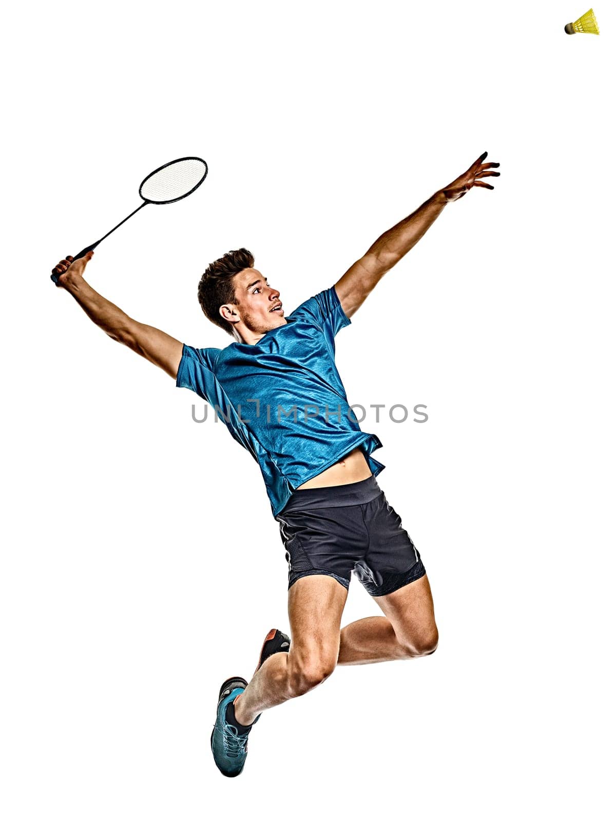 one caucasian youg Badminton player man in studio isolated on white background