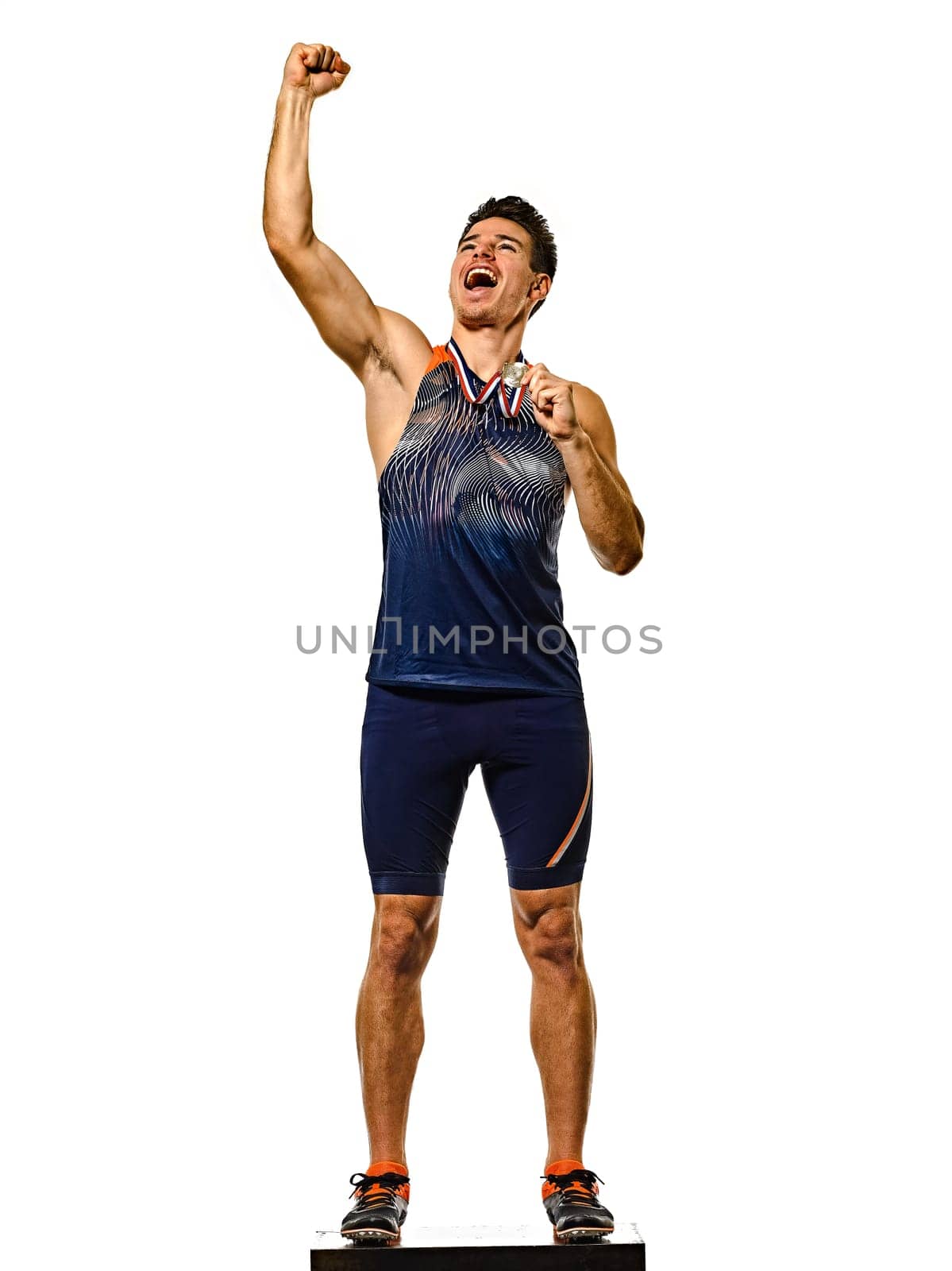 one young caucasian man athetle gold medalist athletics in studio isolated on white background