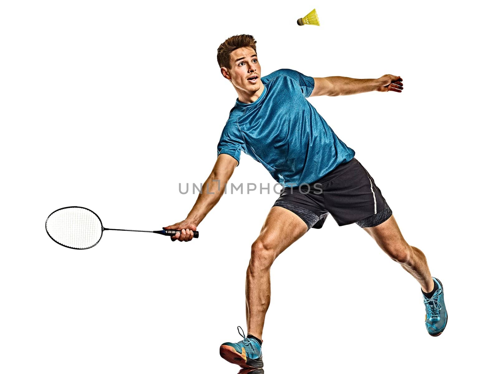 one caucasian young Badminton player man in studio isolated on white background