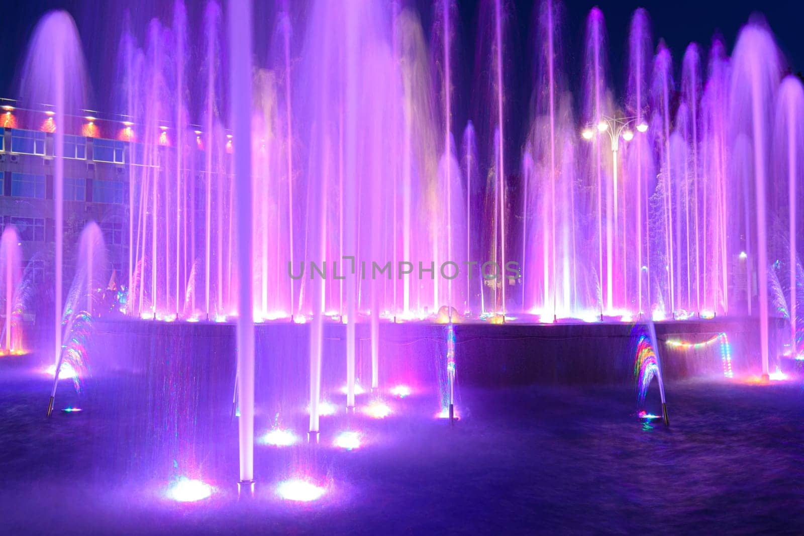 Close-up of the vertically gushing jets of the fountain, the fountain is installed on the Soviet Square near the administration building in Anapa