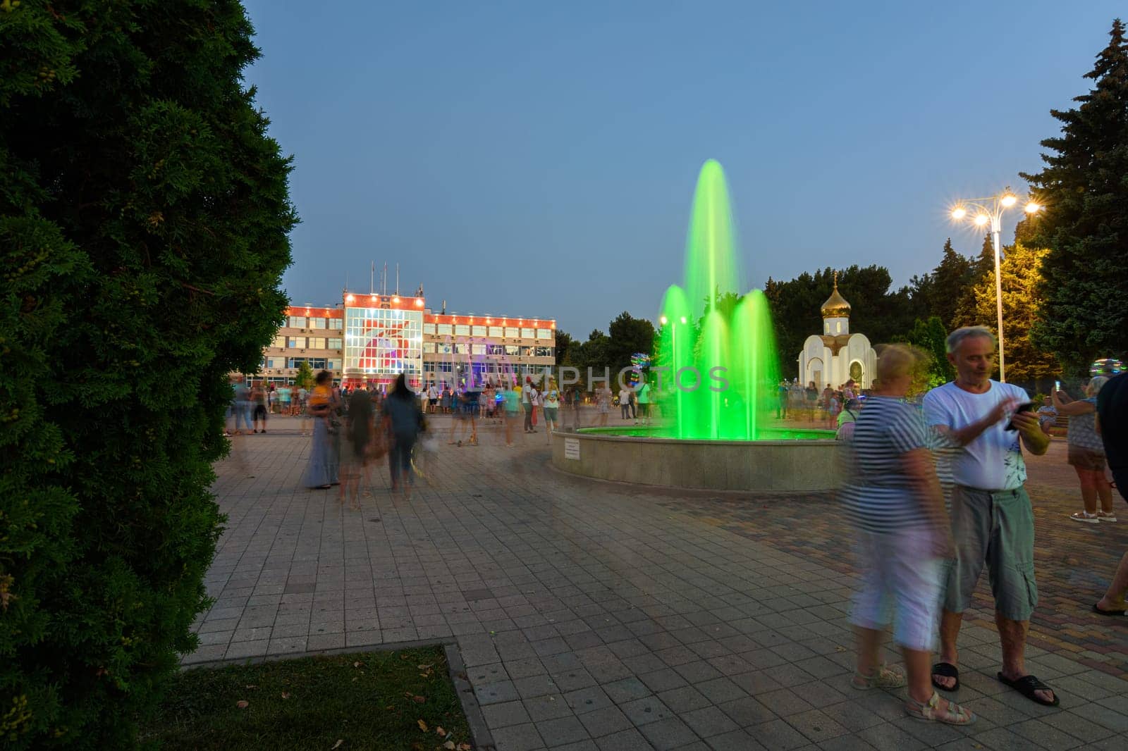 Anapa, Russia - July 17, 2020: Tourist-filled Soviets Square in Anapa, beautiful fountains in front of the city administration of the Anapa resort