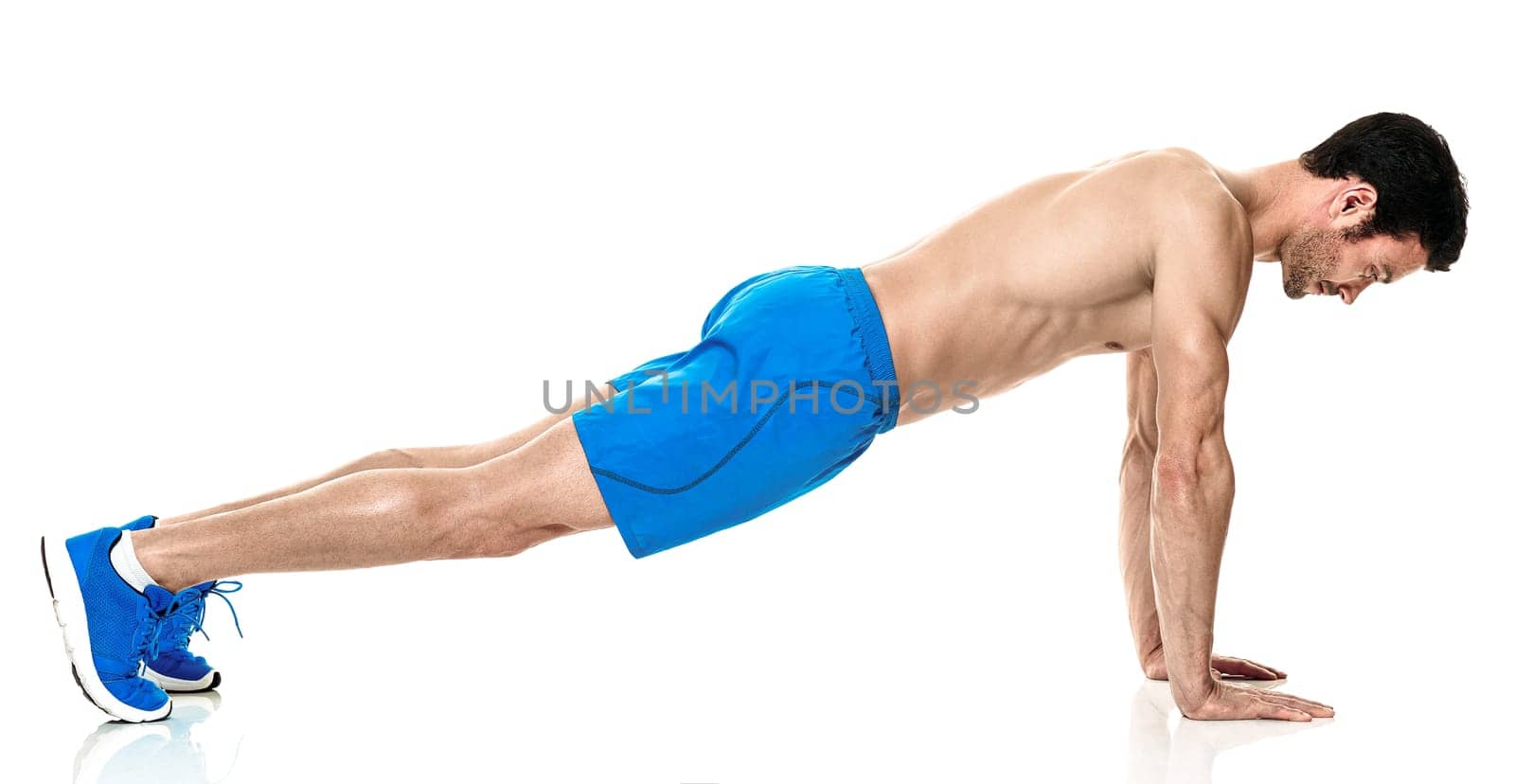 one caucasian man exercising fitness exercises isolated on white background
