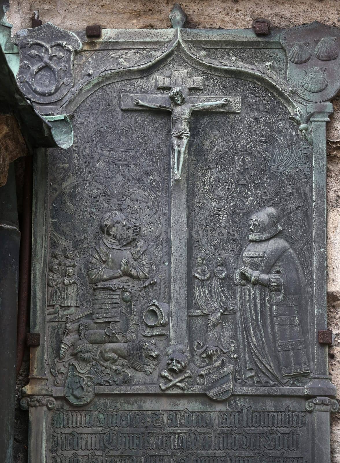 An old crucifixion relief sculpture outside St. Stephen's Cathedral in Vienna, Austria