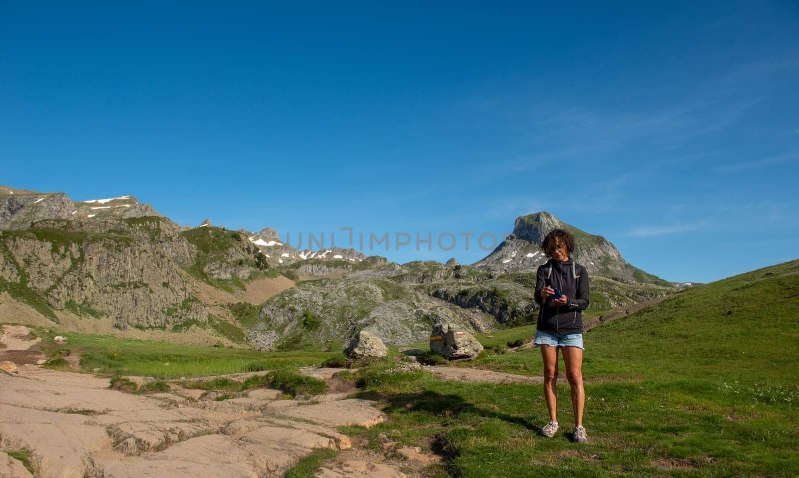 an hiker woman in the french Pyrenees mountains