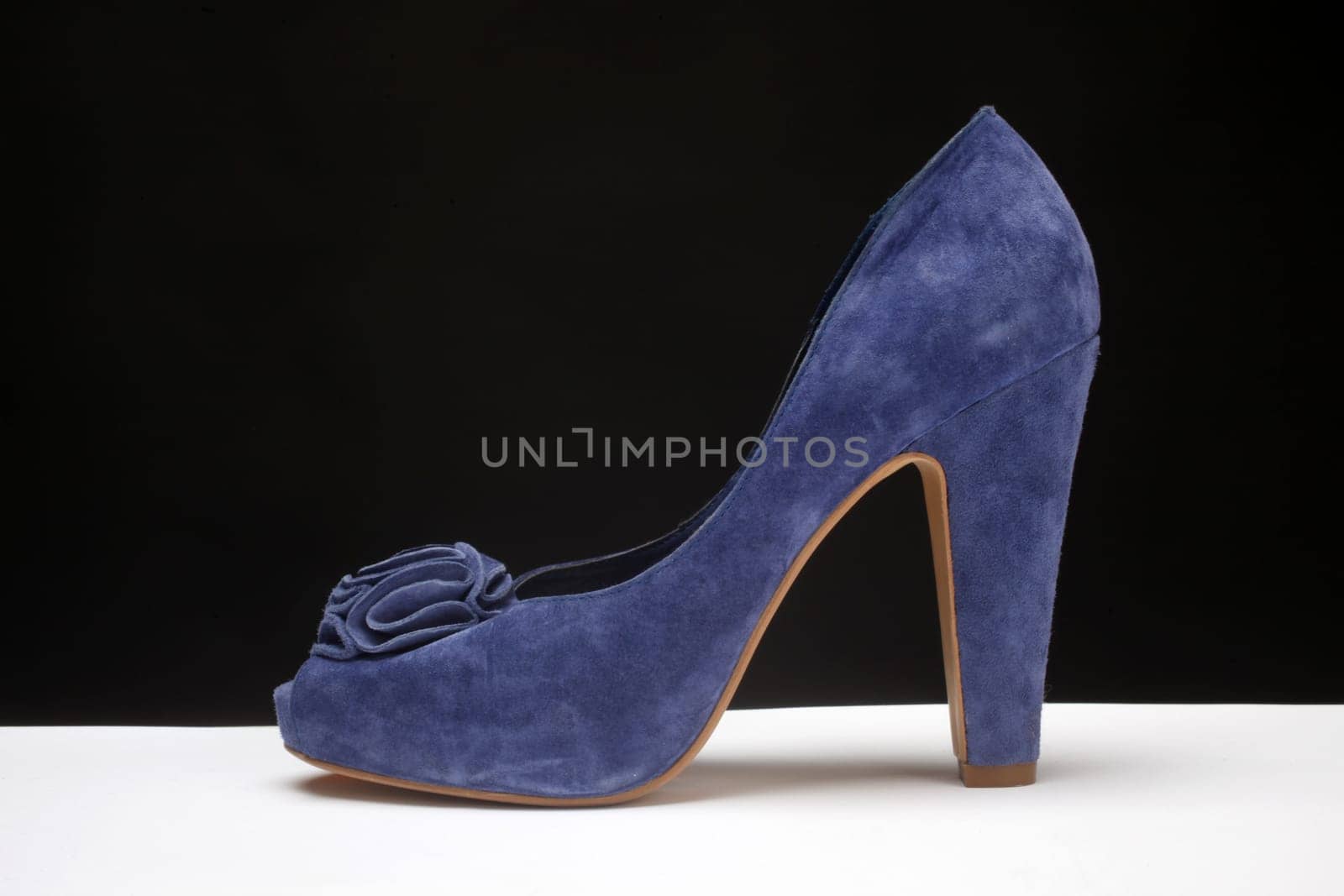 Blue high heeled shoe