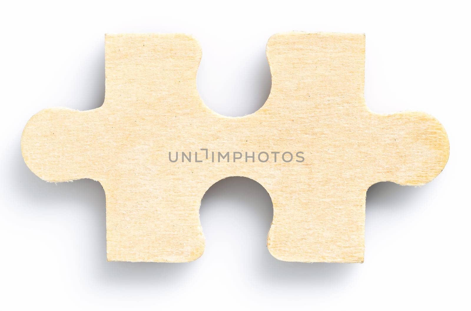 Close up shot of one wood jigsaw puzzel on white background,business concept