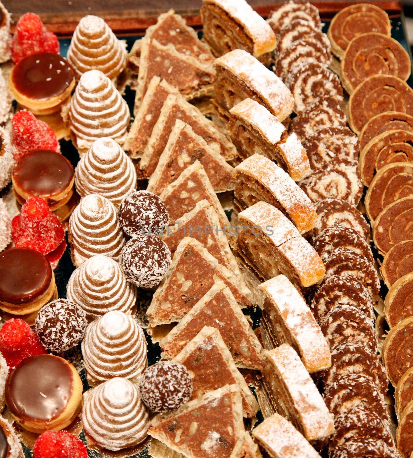 Colorful desserts and pastry served on a wedding party