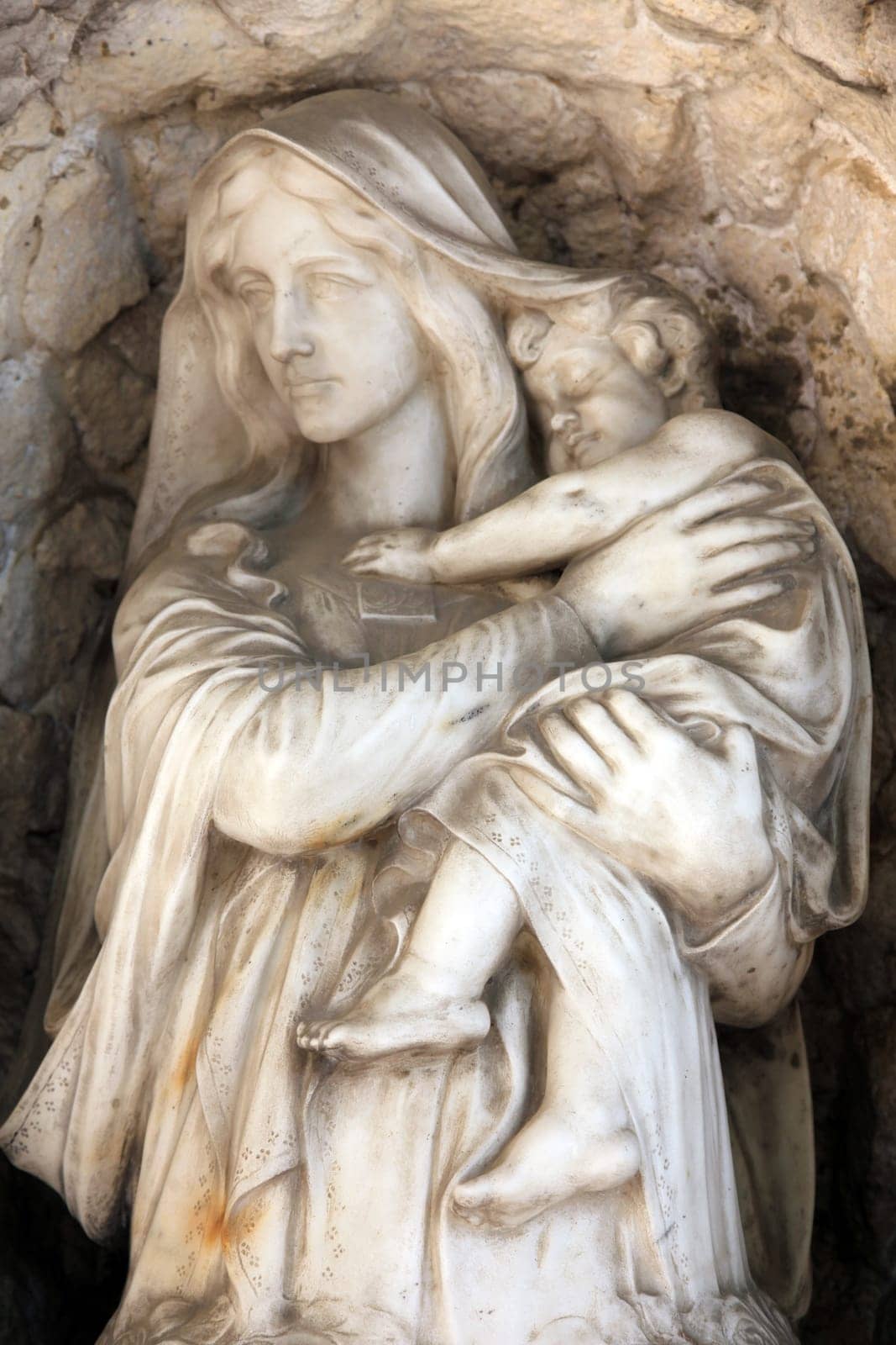 Madonna with Child, detail of a mourning sculpture on a Mirogoj cemetery in Zagreb, Croatia