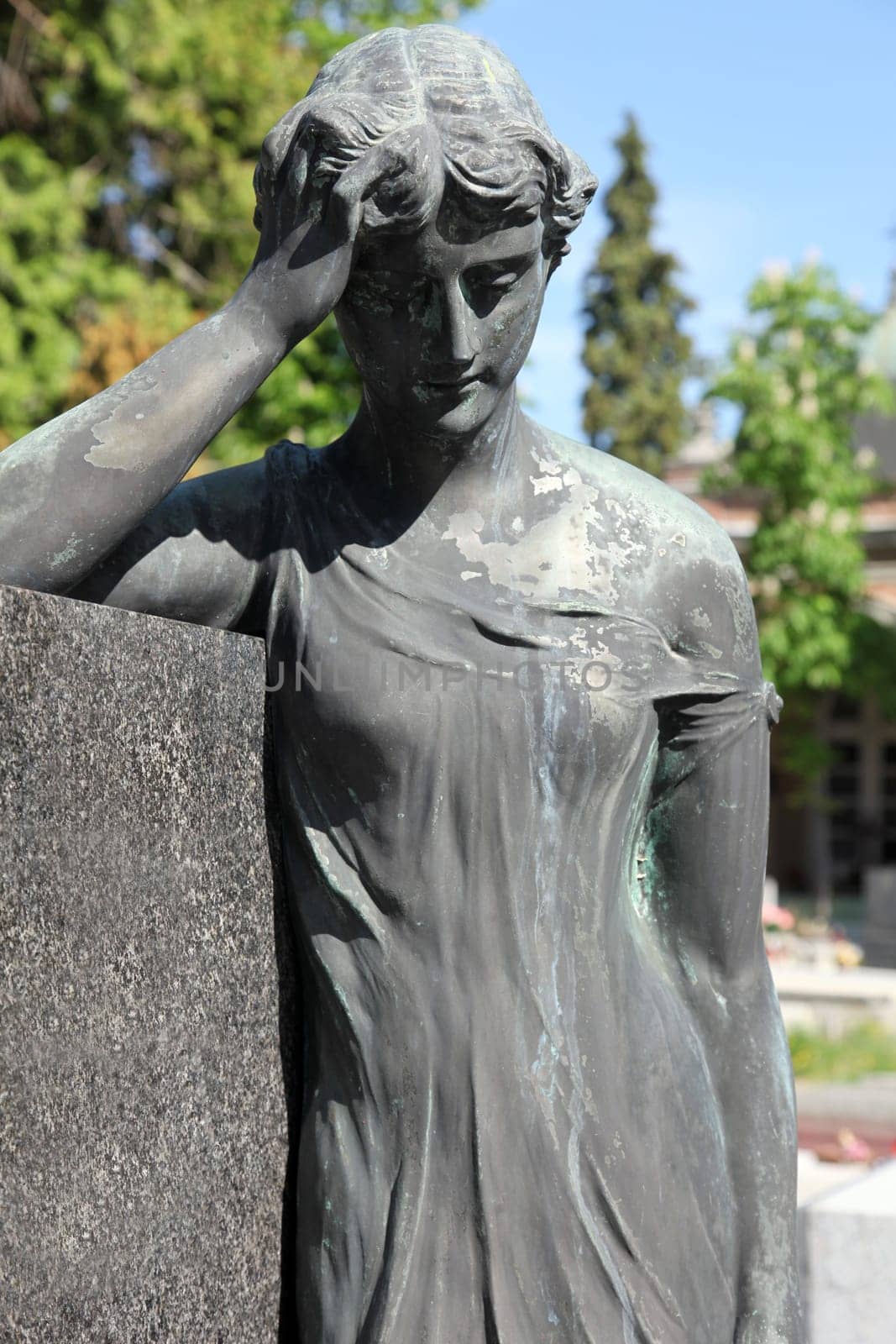 Detail of a mourning sculpture on a Mirogoj cemetery, Zagreb, Croatia
