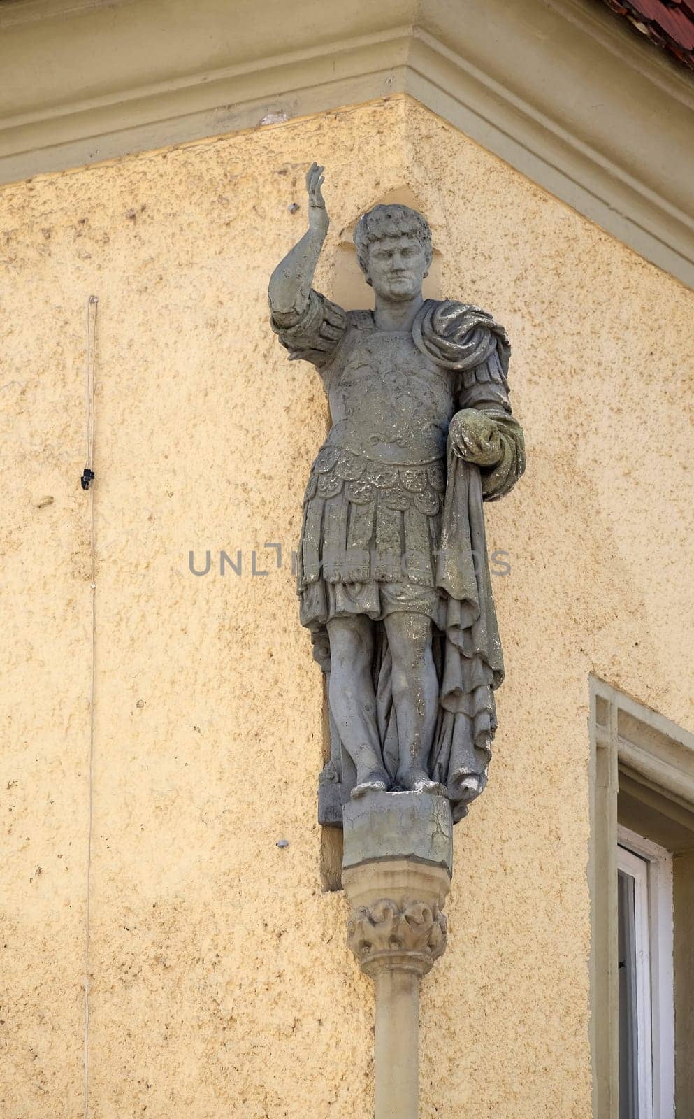 Statue of saint on the house facade in Ptuj, town on the Drava River banks, Lower Styria Region, Slovenia