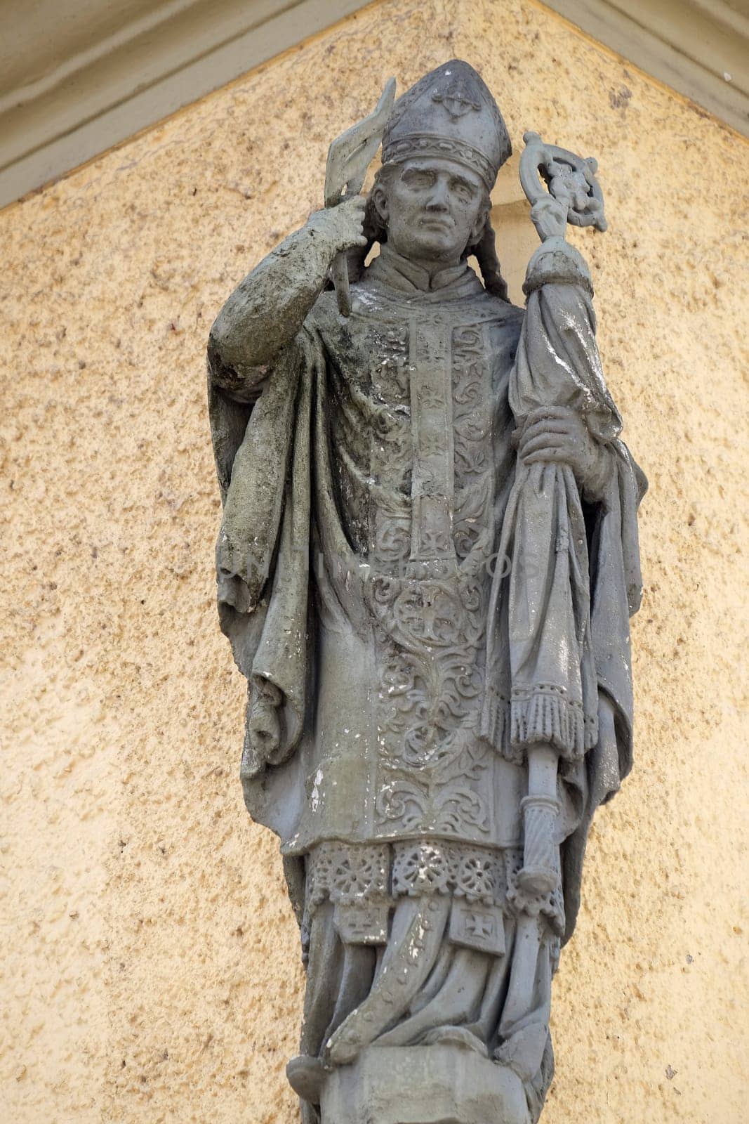 Statue of saint on the house facade in Ptuj, town on the Drava River banks, Lower Styria Region, Slovenia