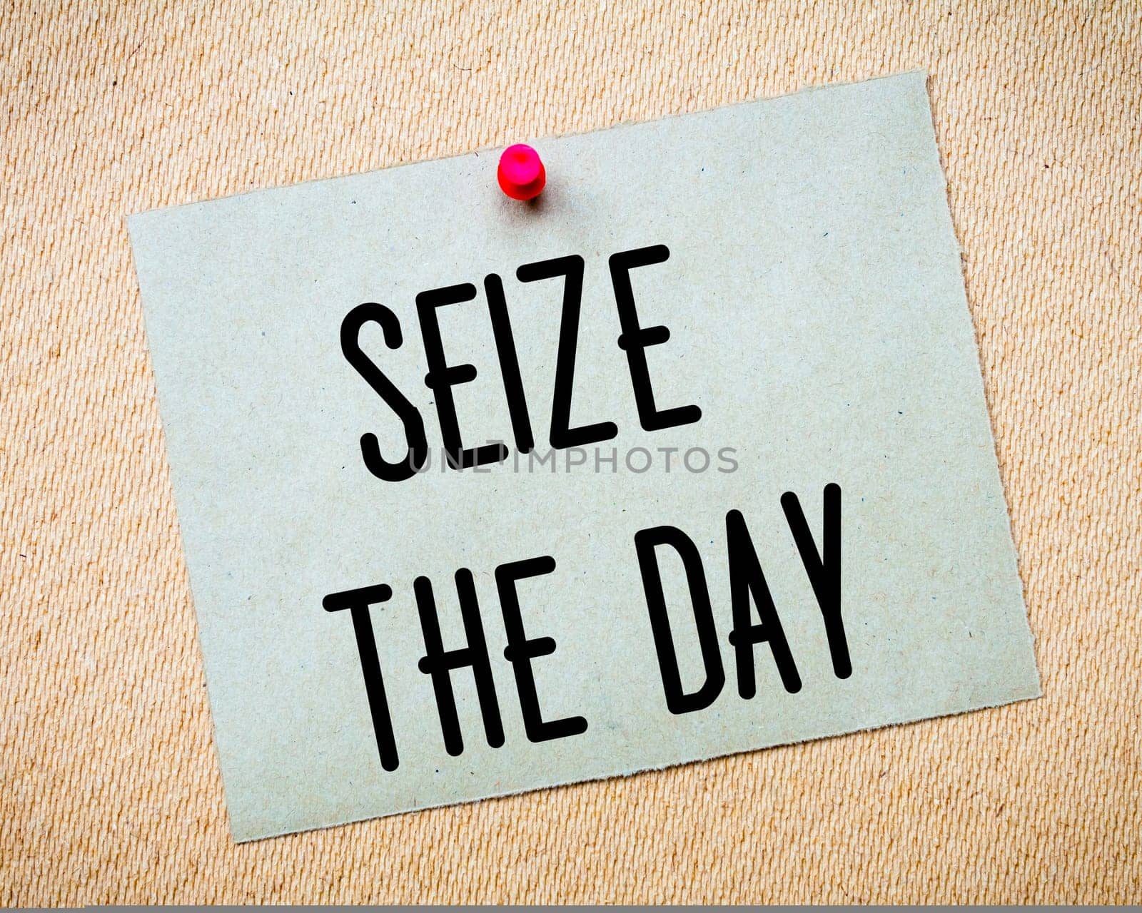 Recycled paper note pinned on cork board.Enjoy Life Message.Happiness Concept Image