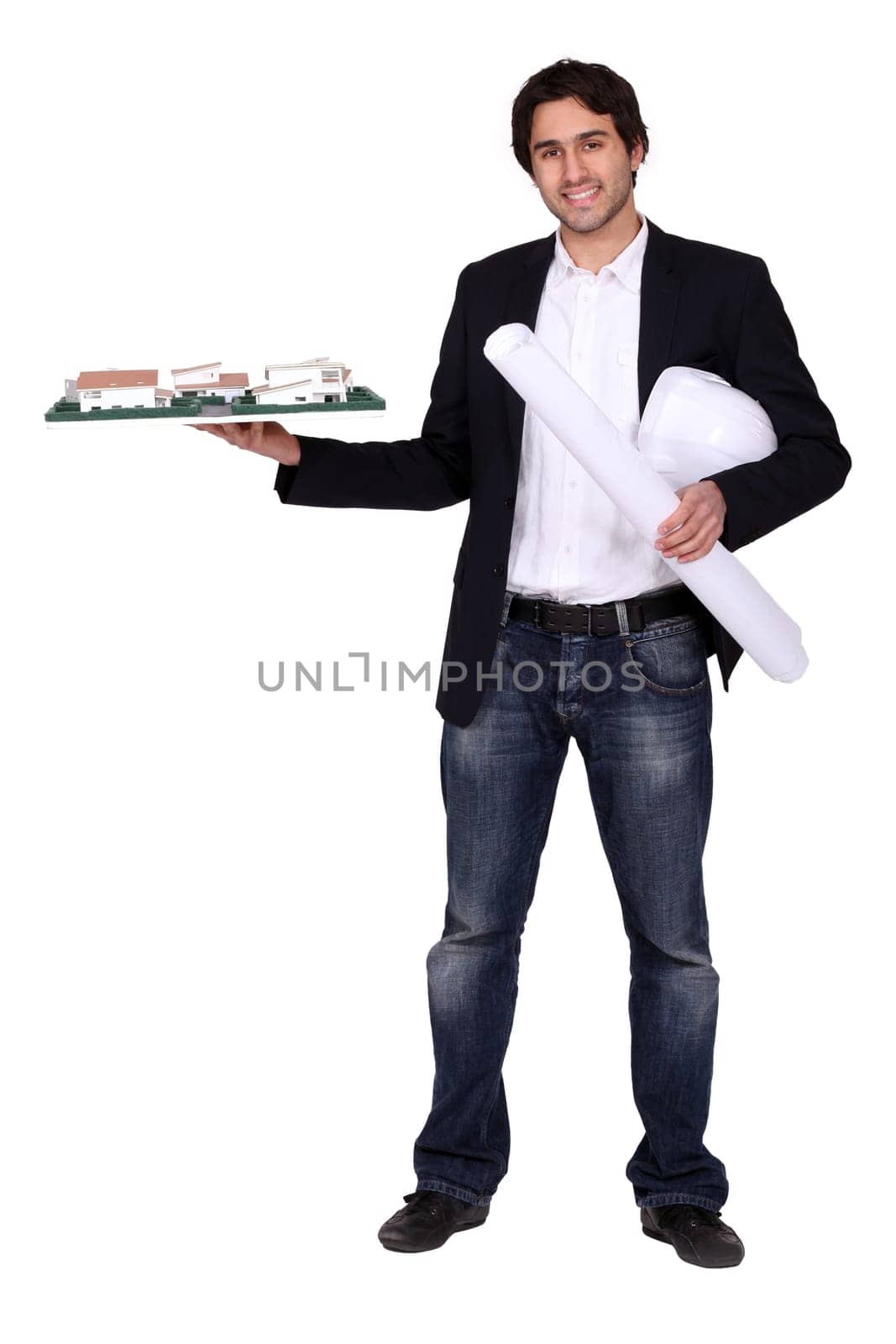 Architect holding a rolled-up blueprint