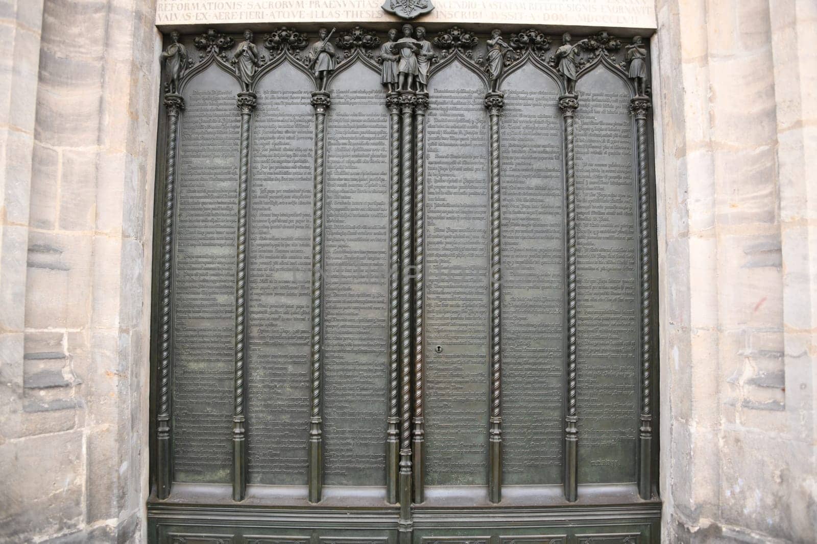Close-up of the 95 disputation theories of Martin Luther at the thesis door of the Schlosskirche in Wittenberg,Germany