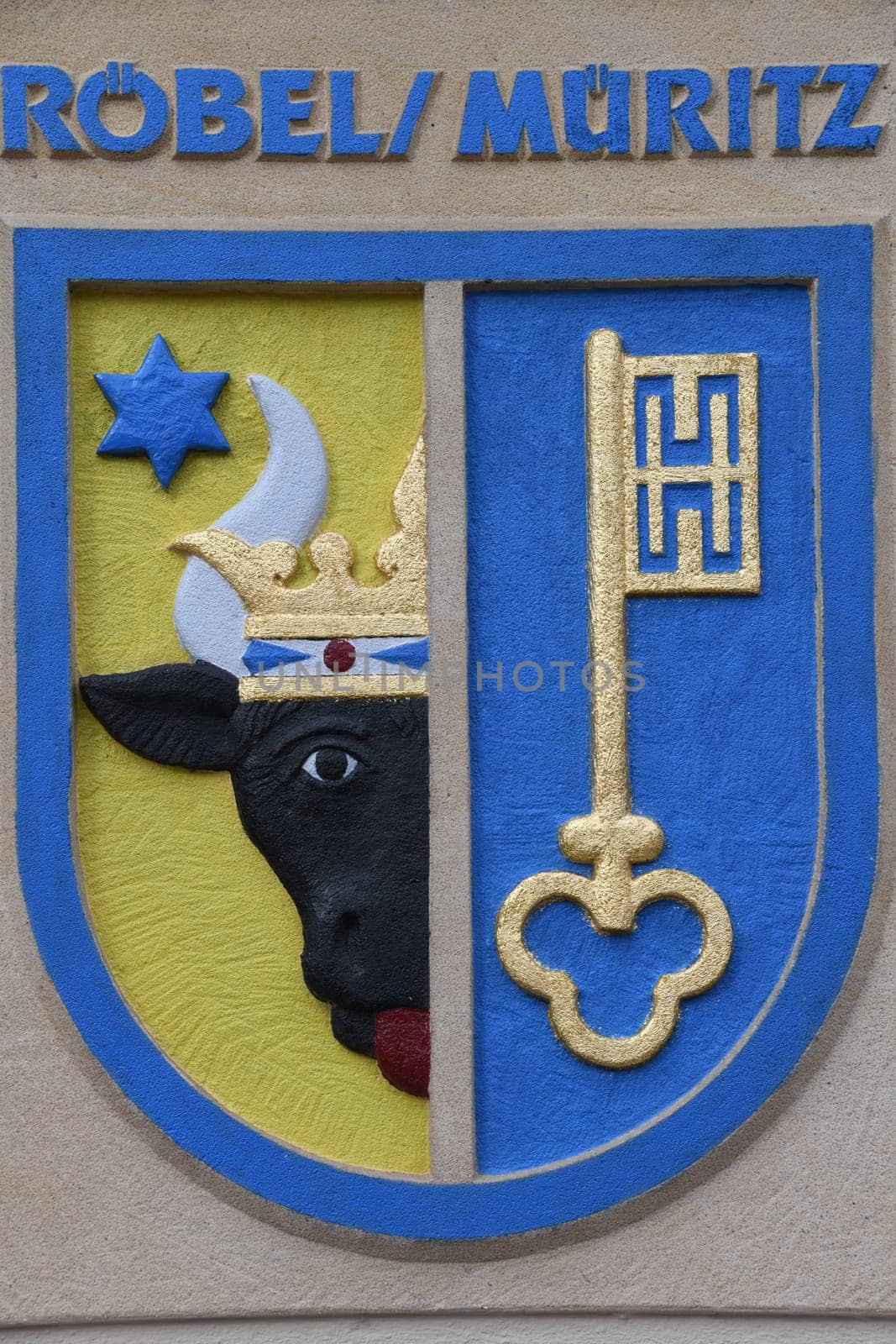 The historical coat of arms of the town of Röbel an der Müritz. It is located at the town hall. The city belongs to the German state of Mecklenburg-Vorpommern in Germany.