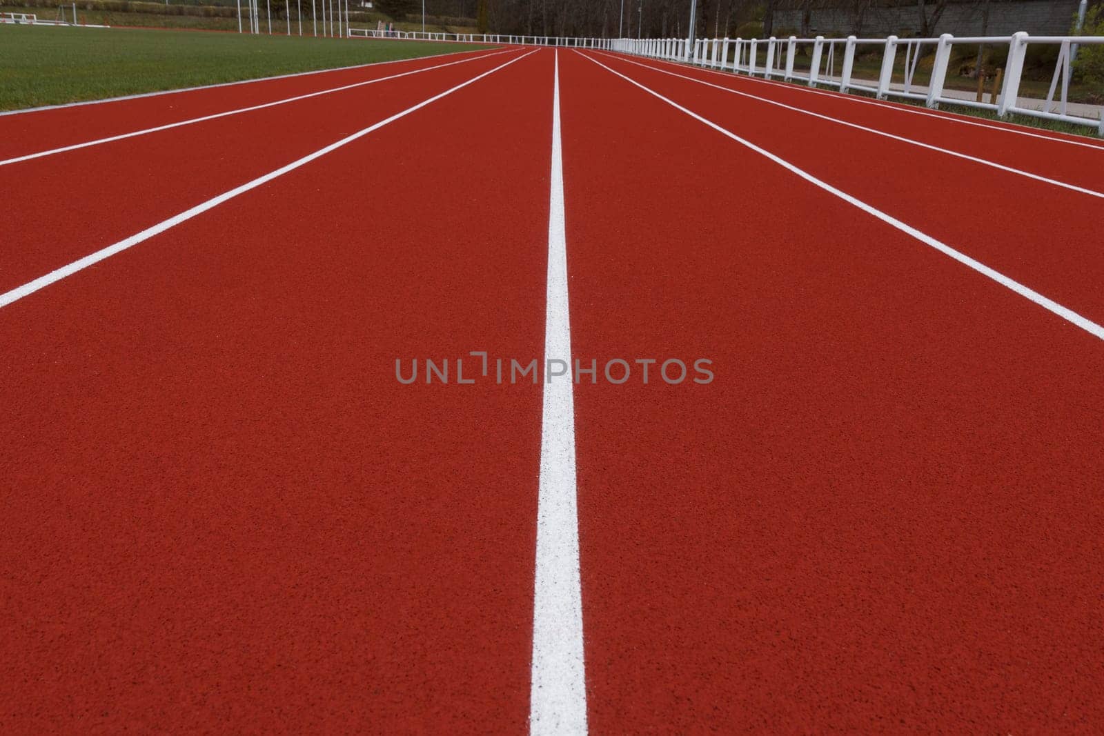 Running track in the small stadium. Rubber coating.