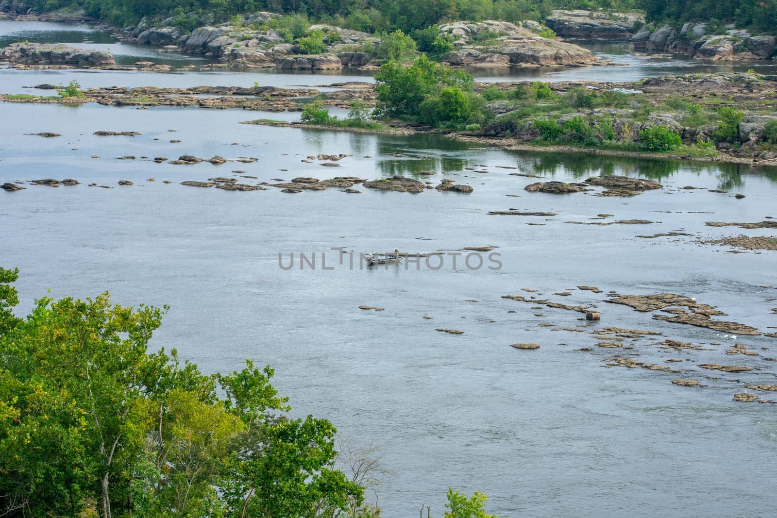 Two Men on a Small Fishing Boat on the Susquehanna River Near Historic Lock 12 in Pennsylvania